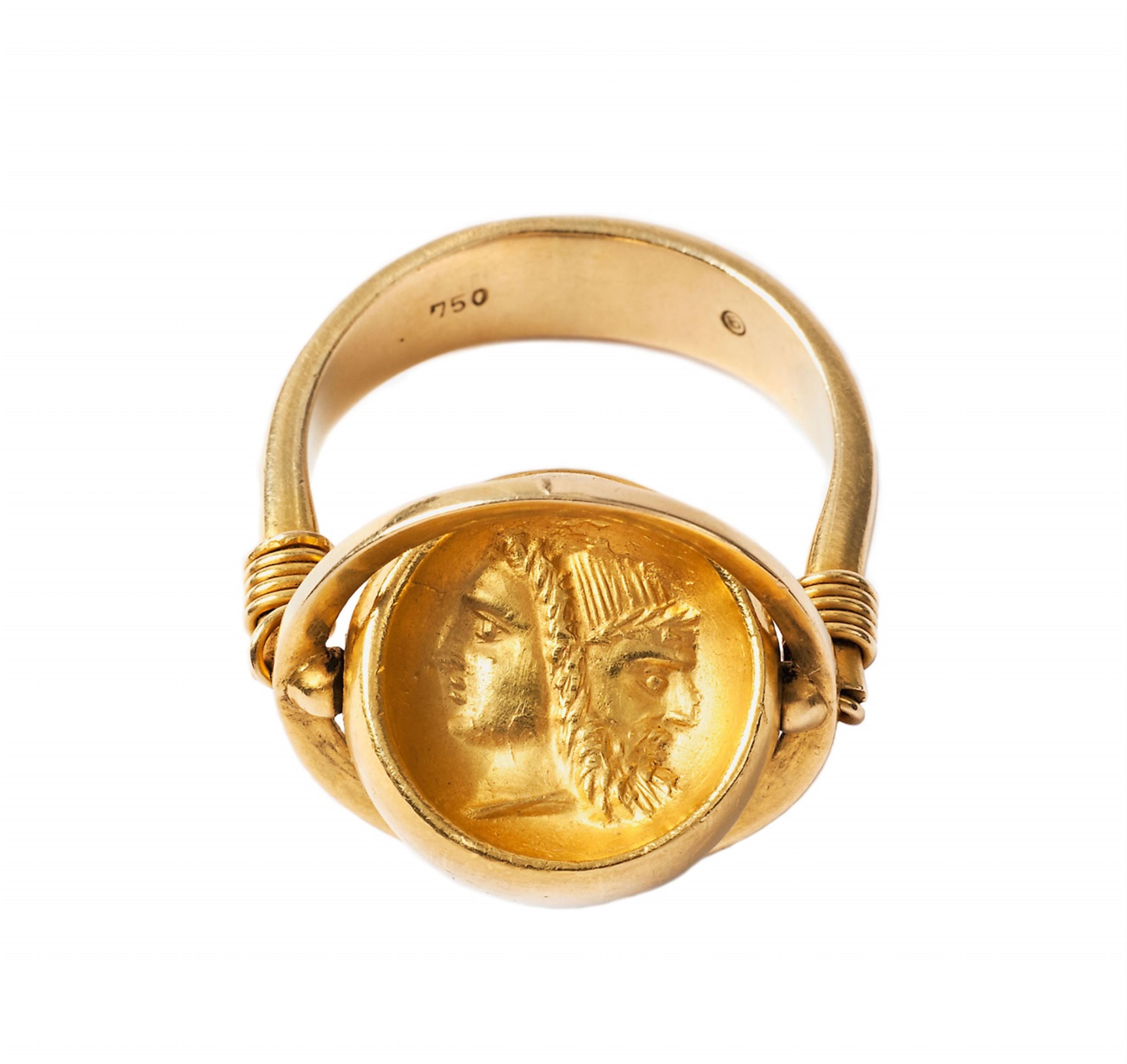 An 18k gold twisting ring with a Roman cameo. - image-1