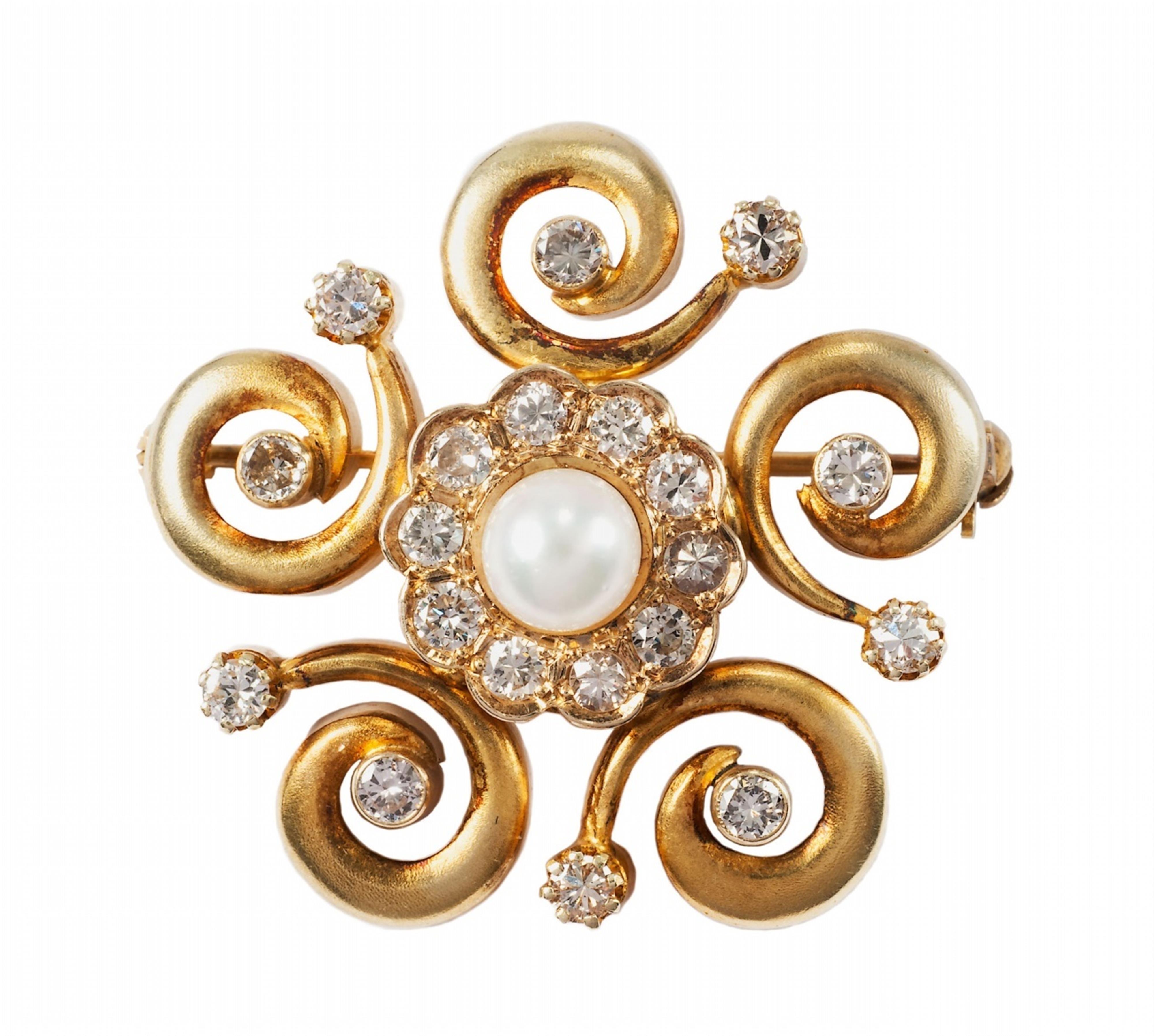 A 14k gold and diamond brooch. - image-1