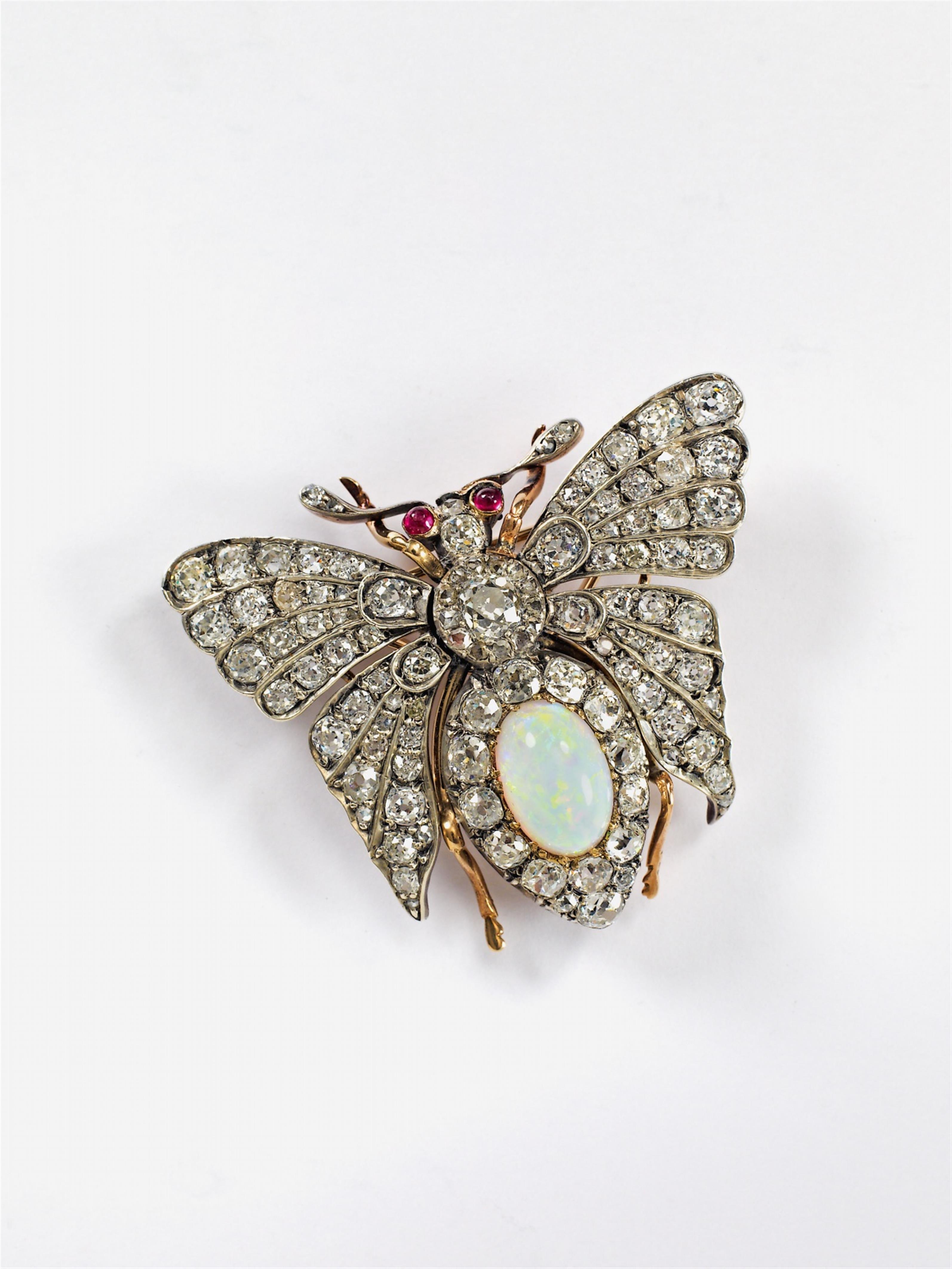 A red gold and silver Belle Epoque brooch formed as a butterfly. - image-1