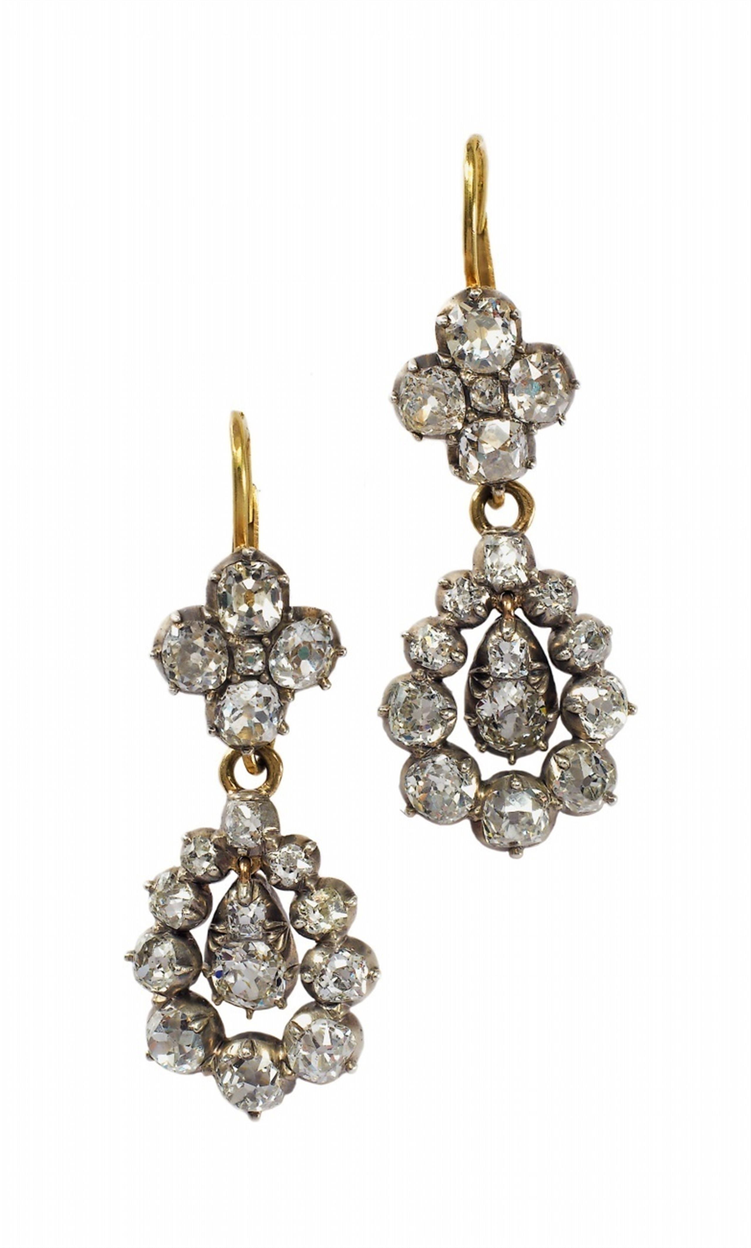 A pair of silver and 14k gold pendant earrings. - image-1