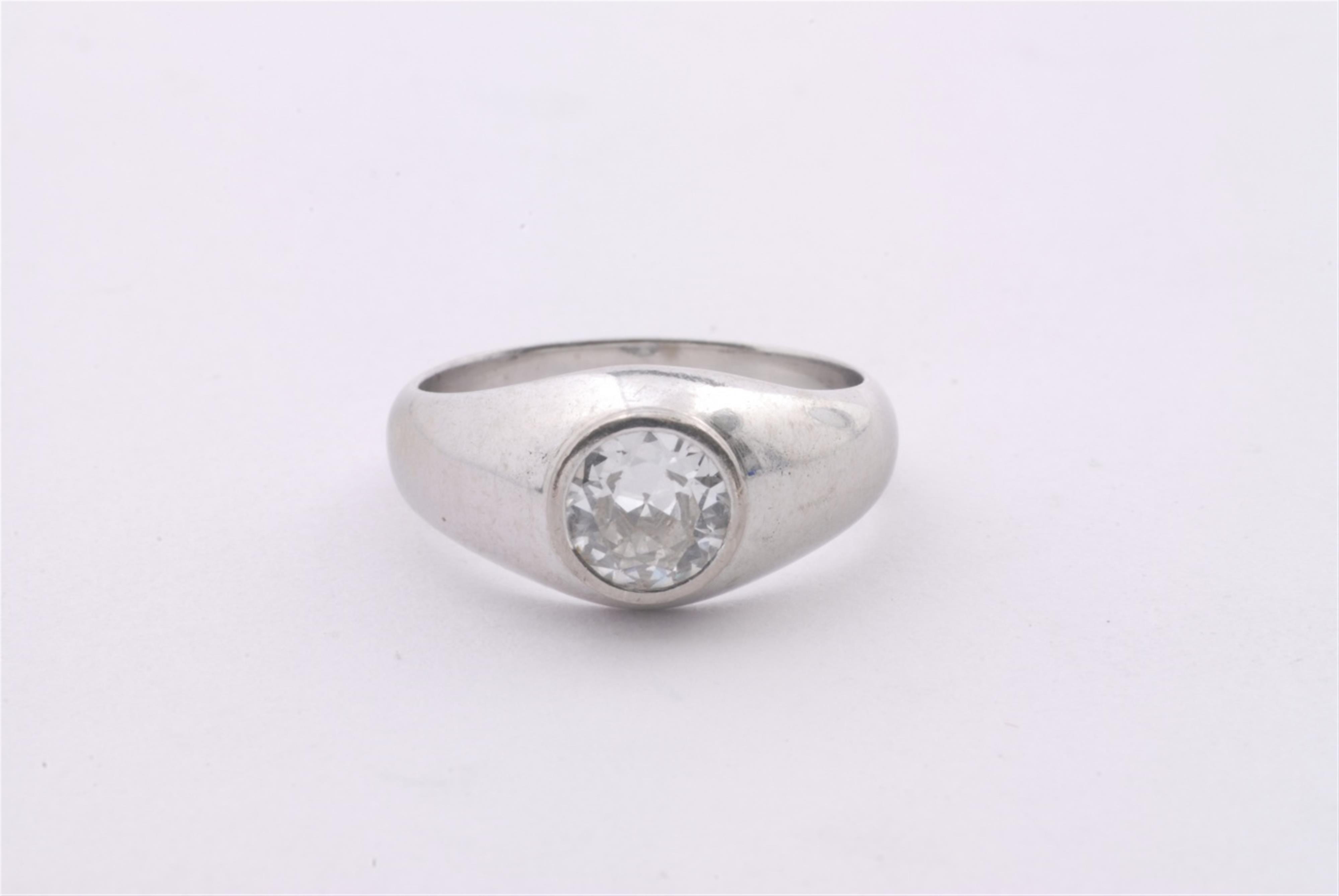 A 14k white gold diamond solitaire ring. - image-1