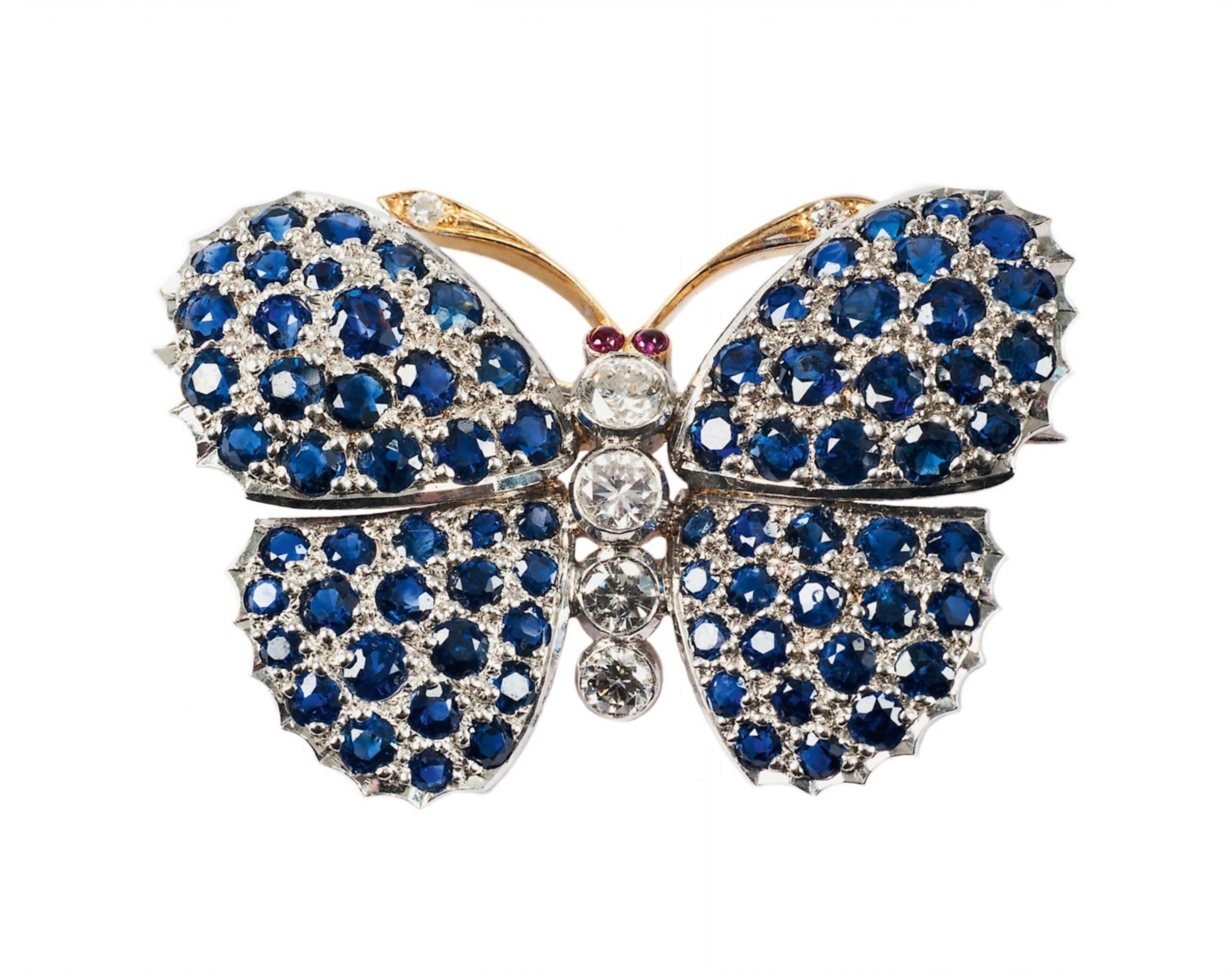 An 18k yellow and white gold butterfly brooch. - image-1