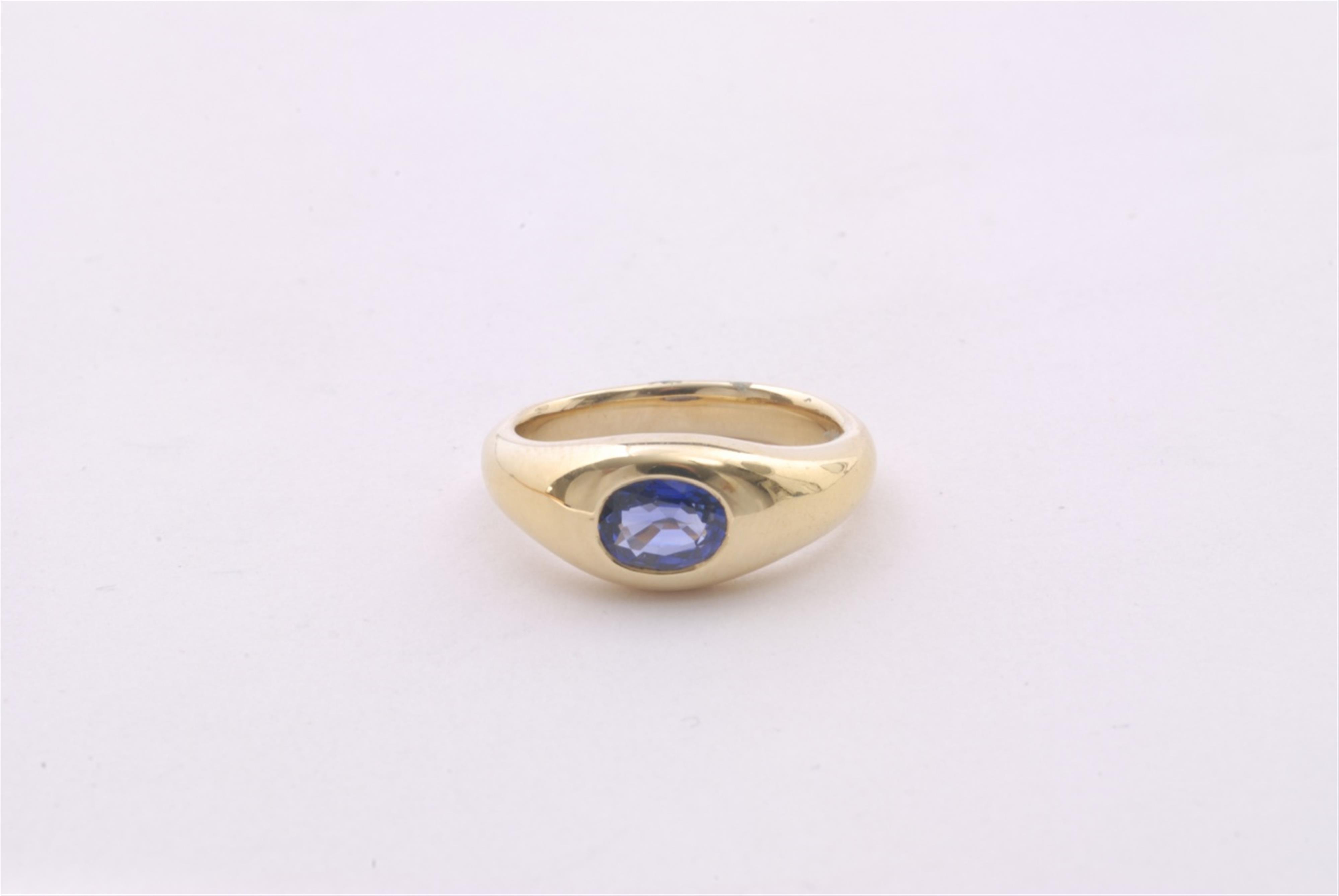 An 18k gold and sapphire ring. - image-1