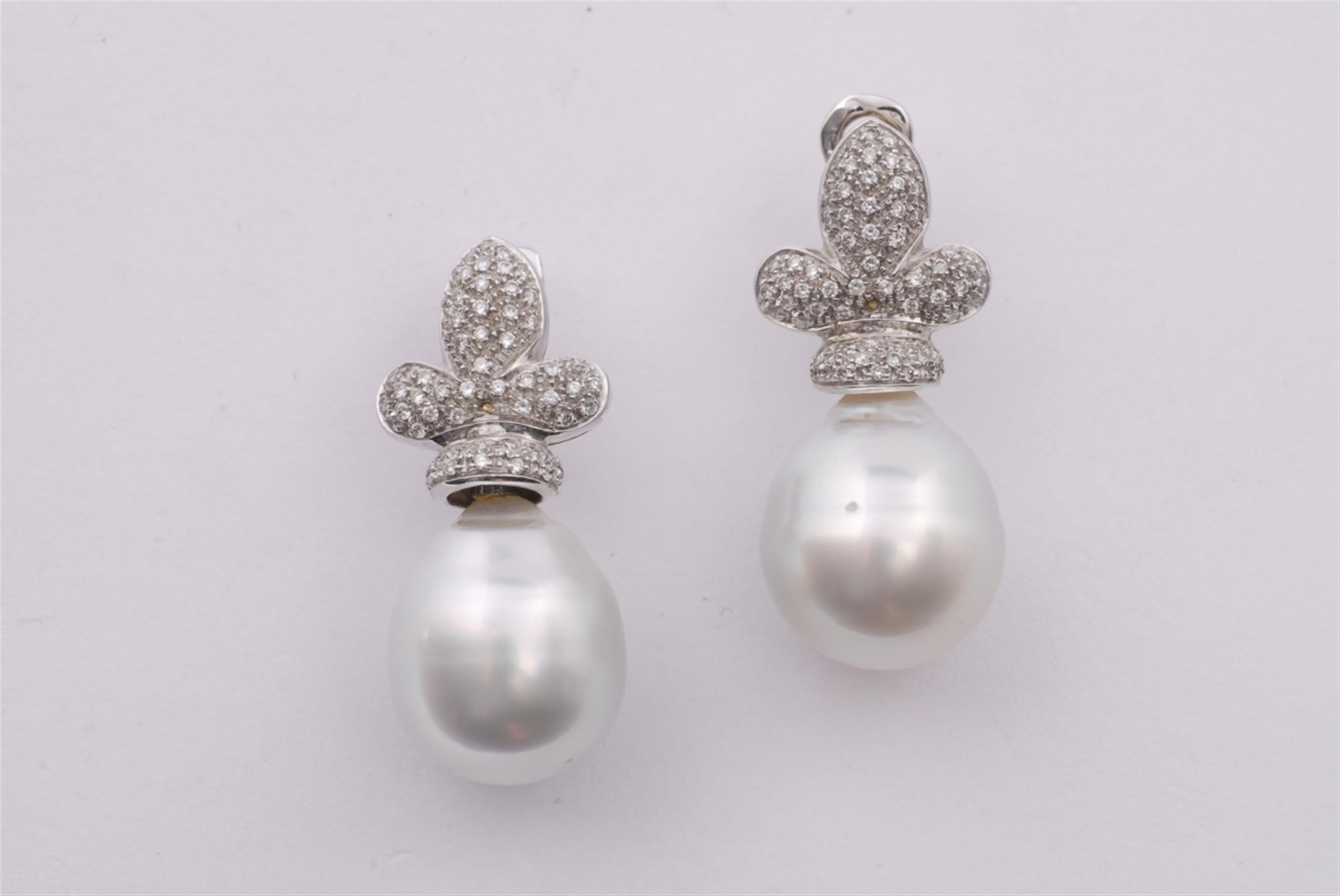 A pair of 18k white gold and South Sea pearl drop earrings. - image-1
