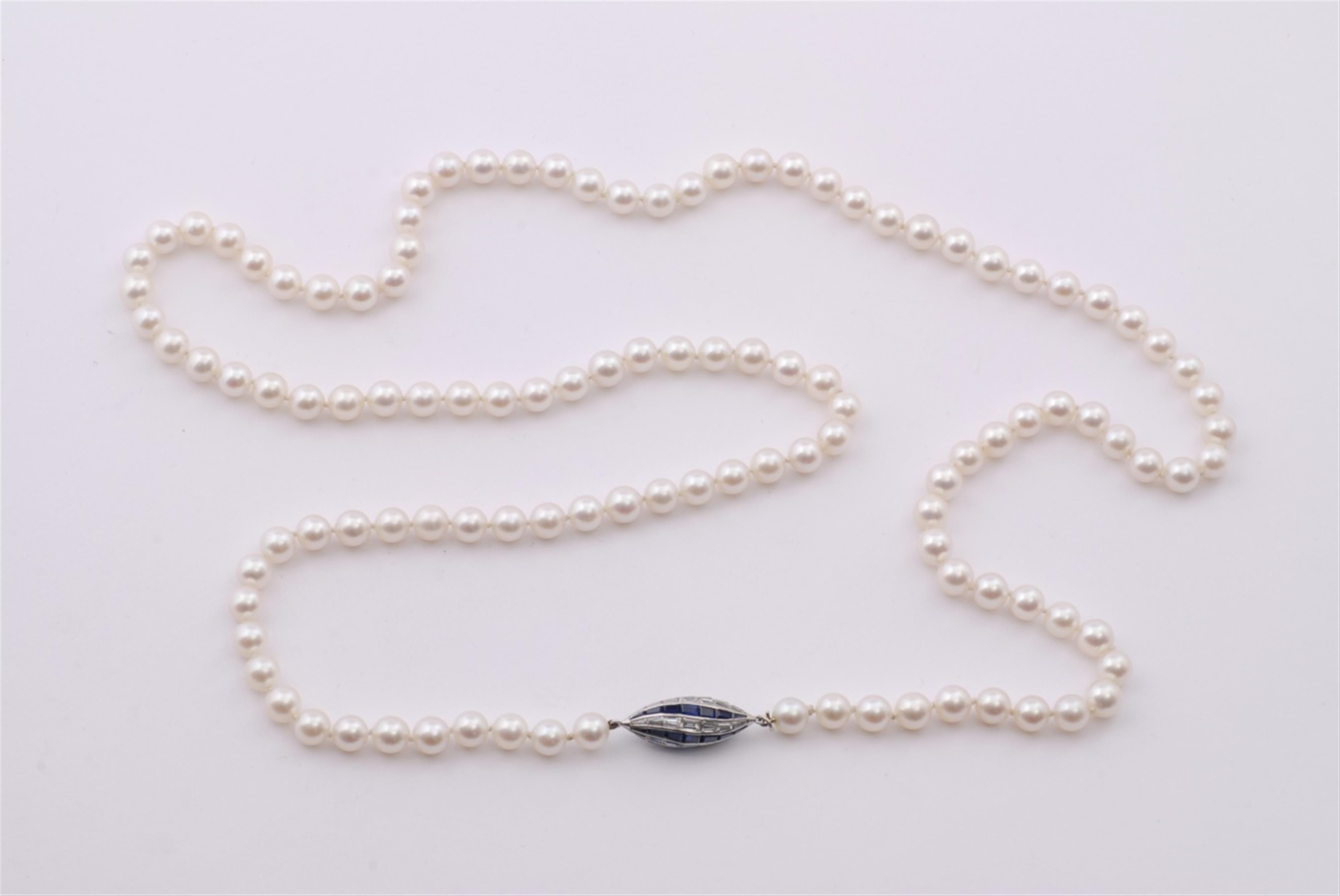 An 18k white gold and pearl sautoir. - image-1