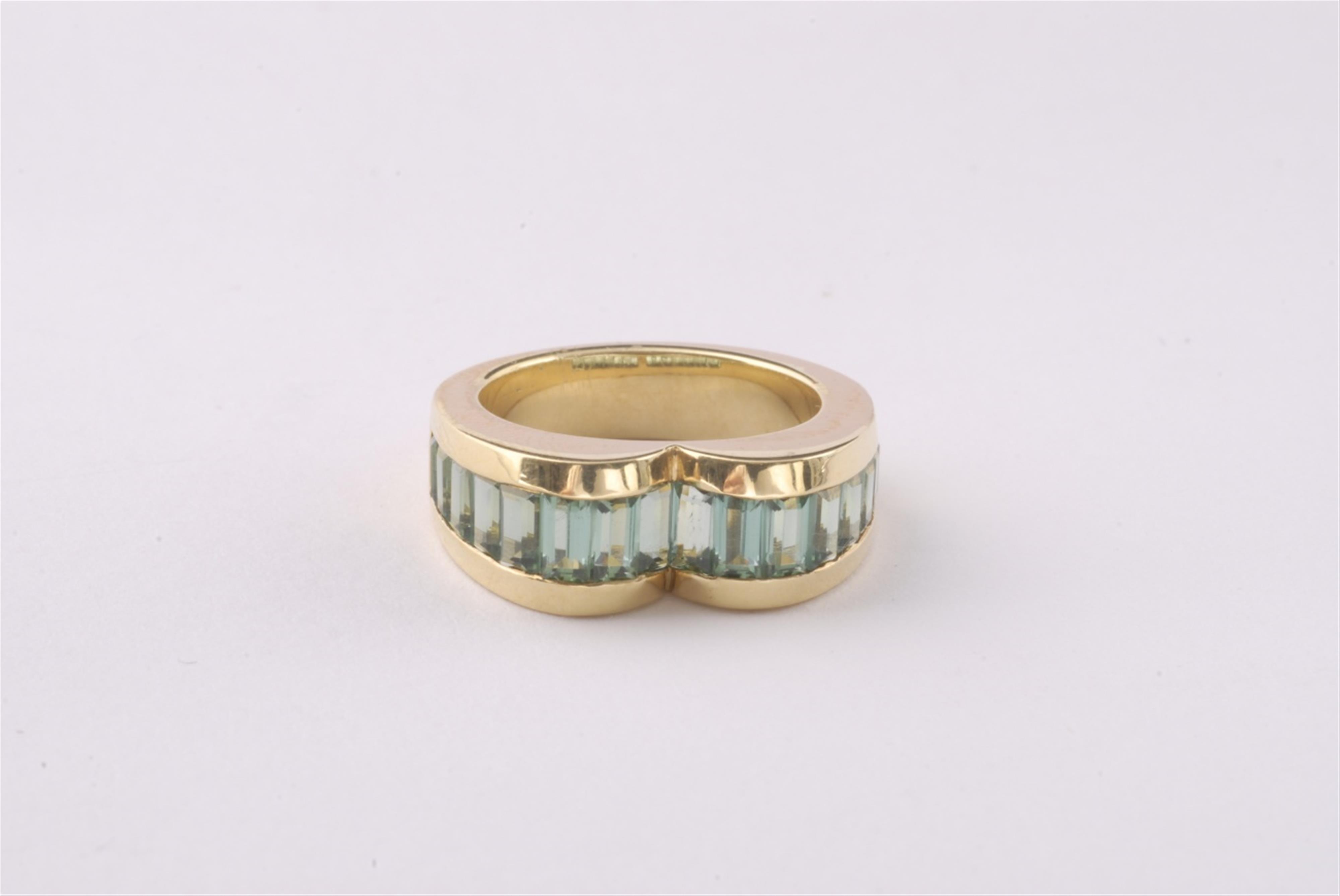 An 18k gold and tourmaline ring. - image-1
