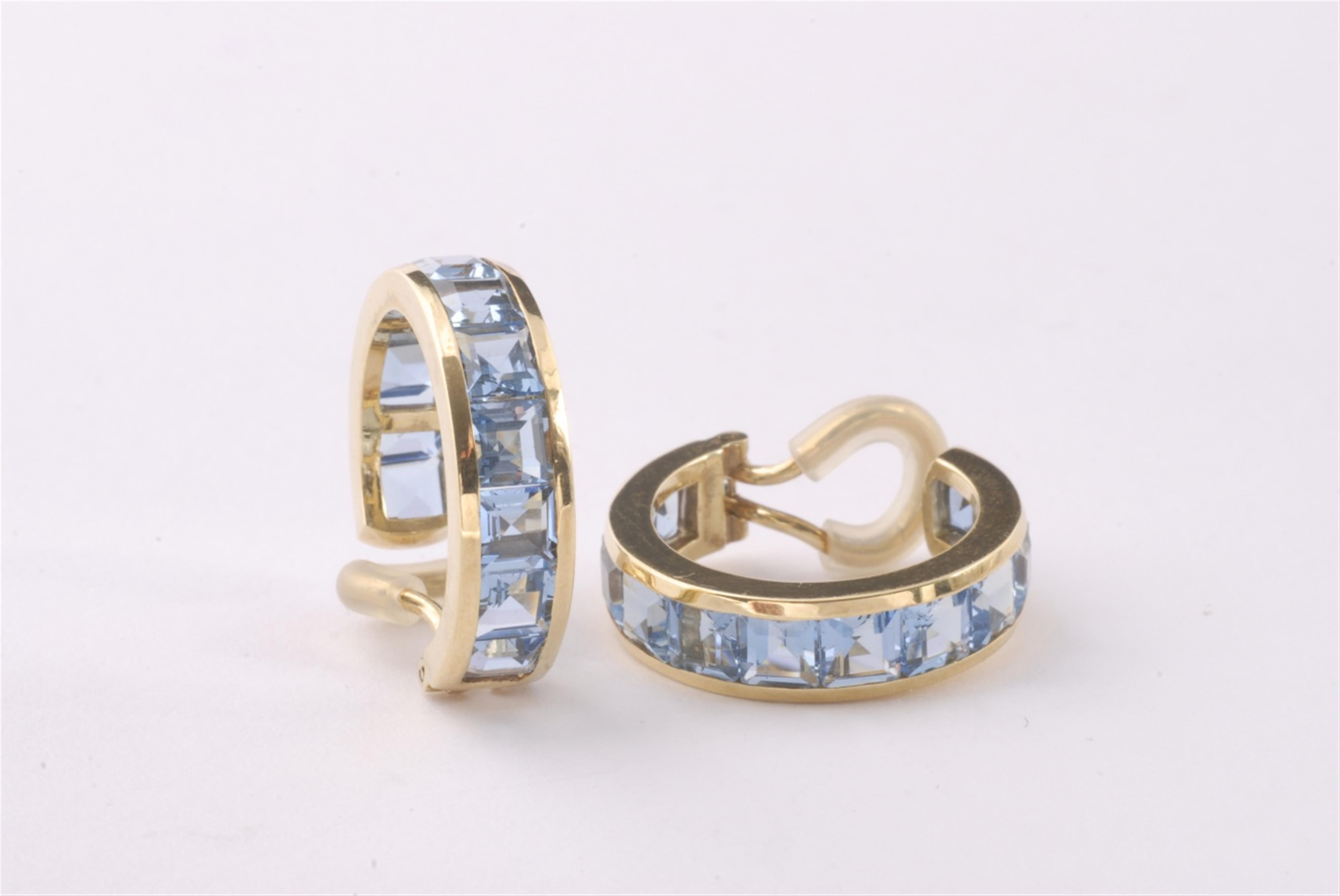 A pair of 18k gold and aquamarine clip earrings. - image-1