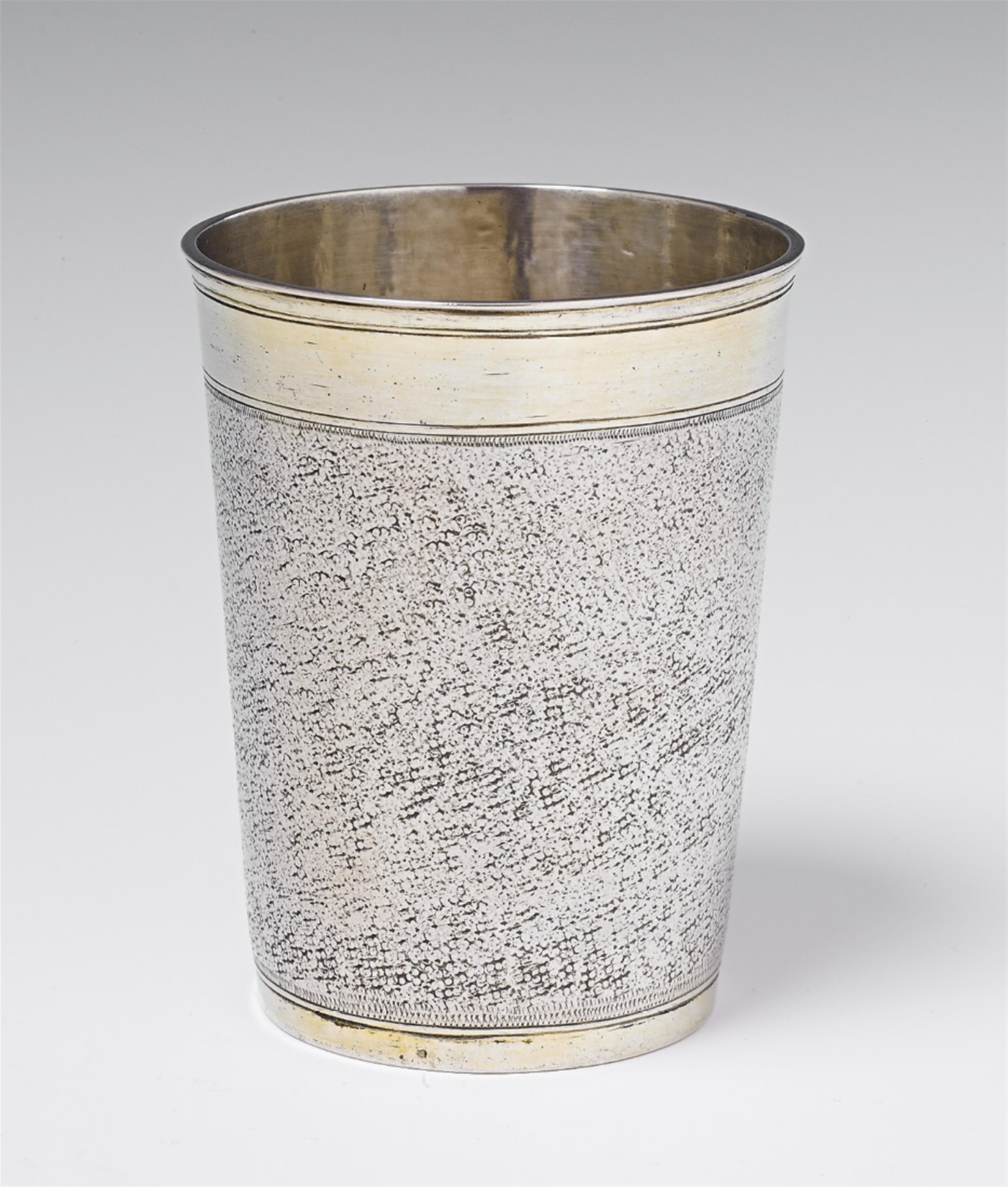 A partially gilt silver snakeskin beaker - image-1