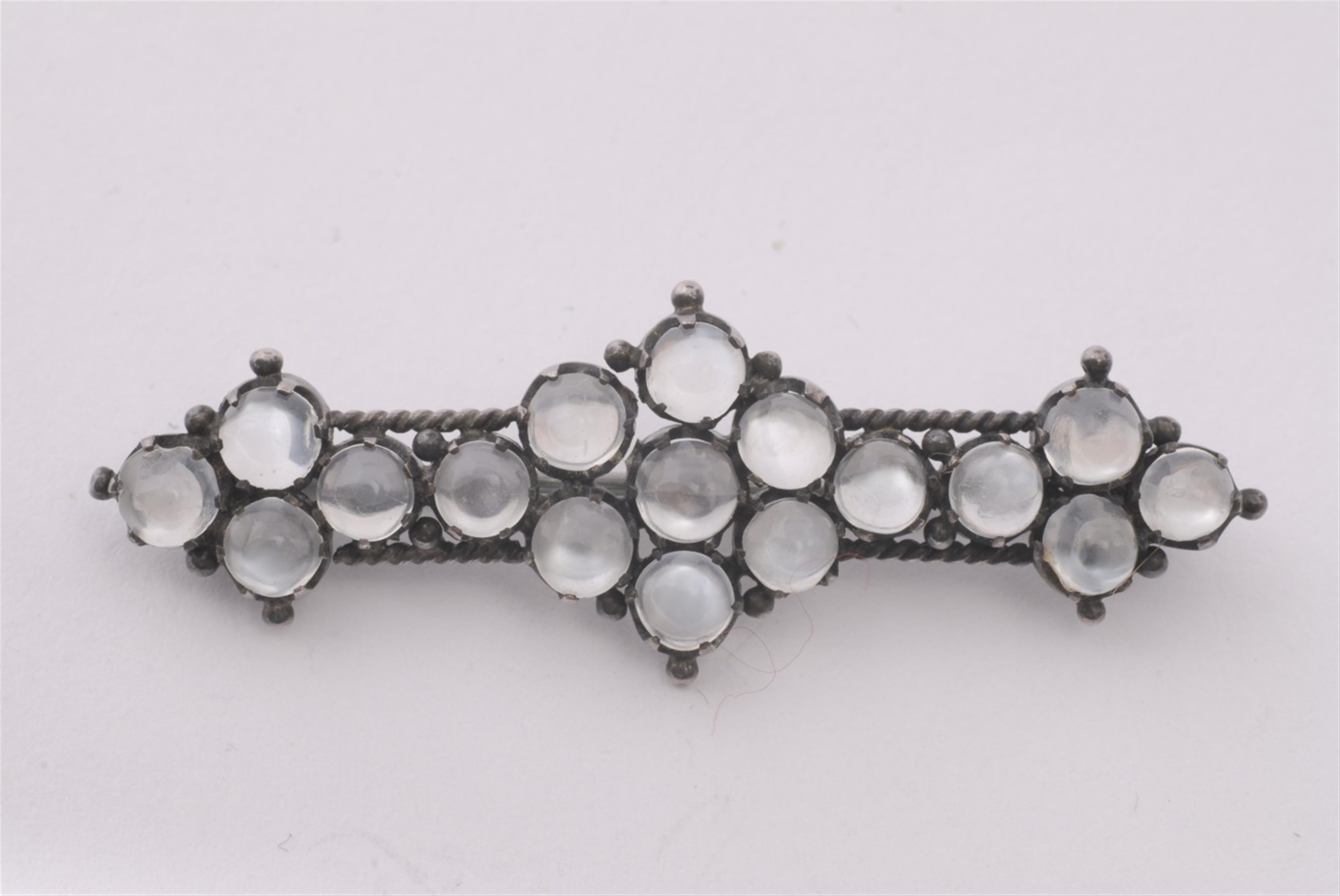 A silver and moonstone belle epoque brooch. - image-1