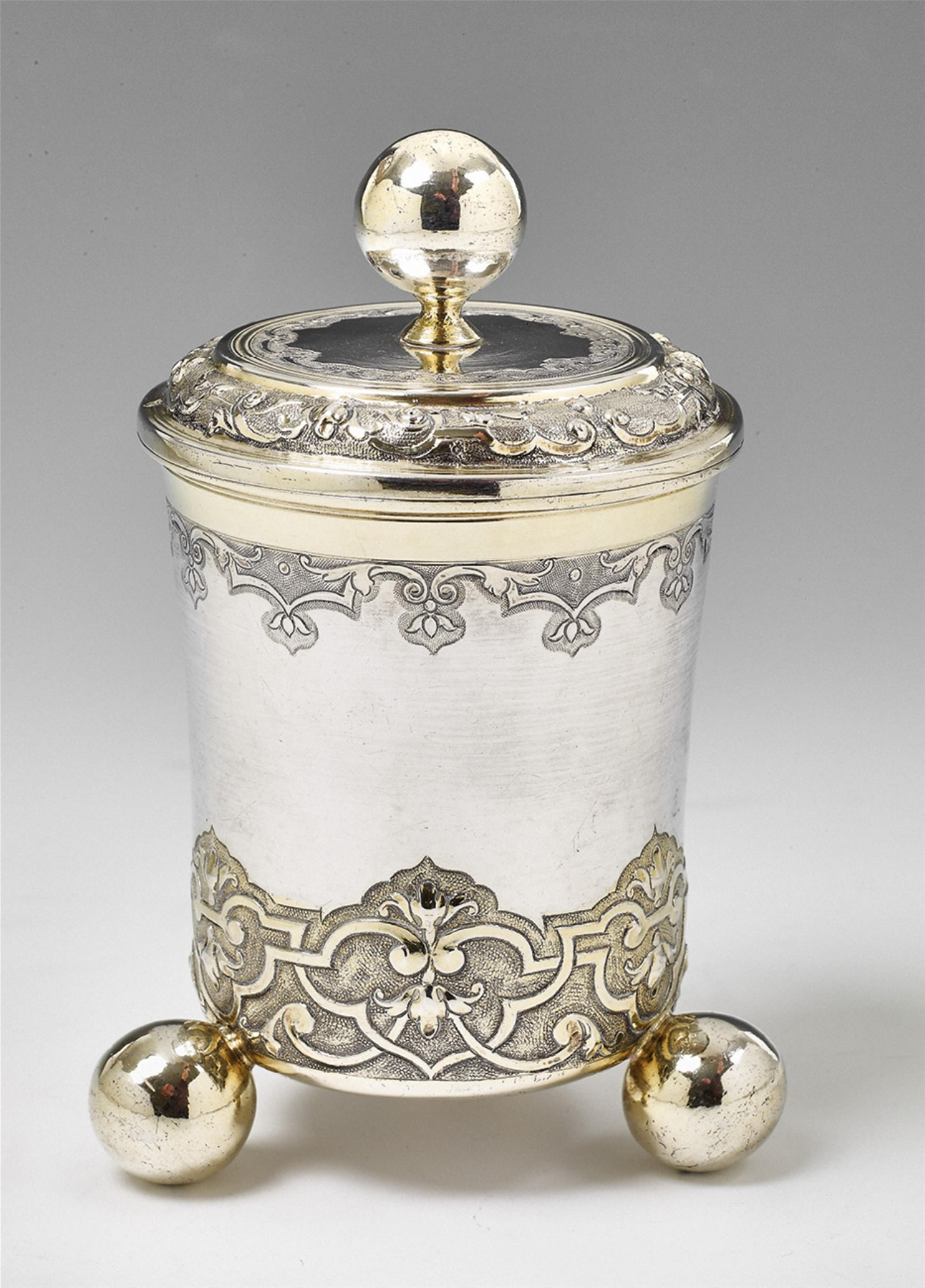 An Augsburg régence partially gilt silver beaker and cover - image-1