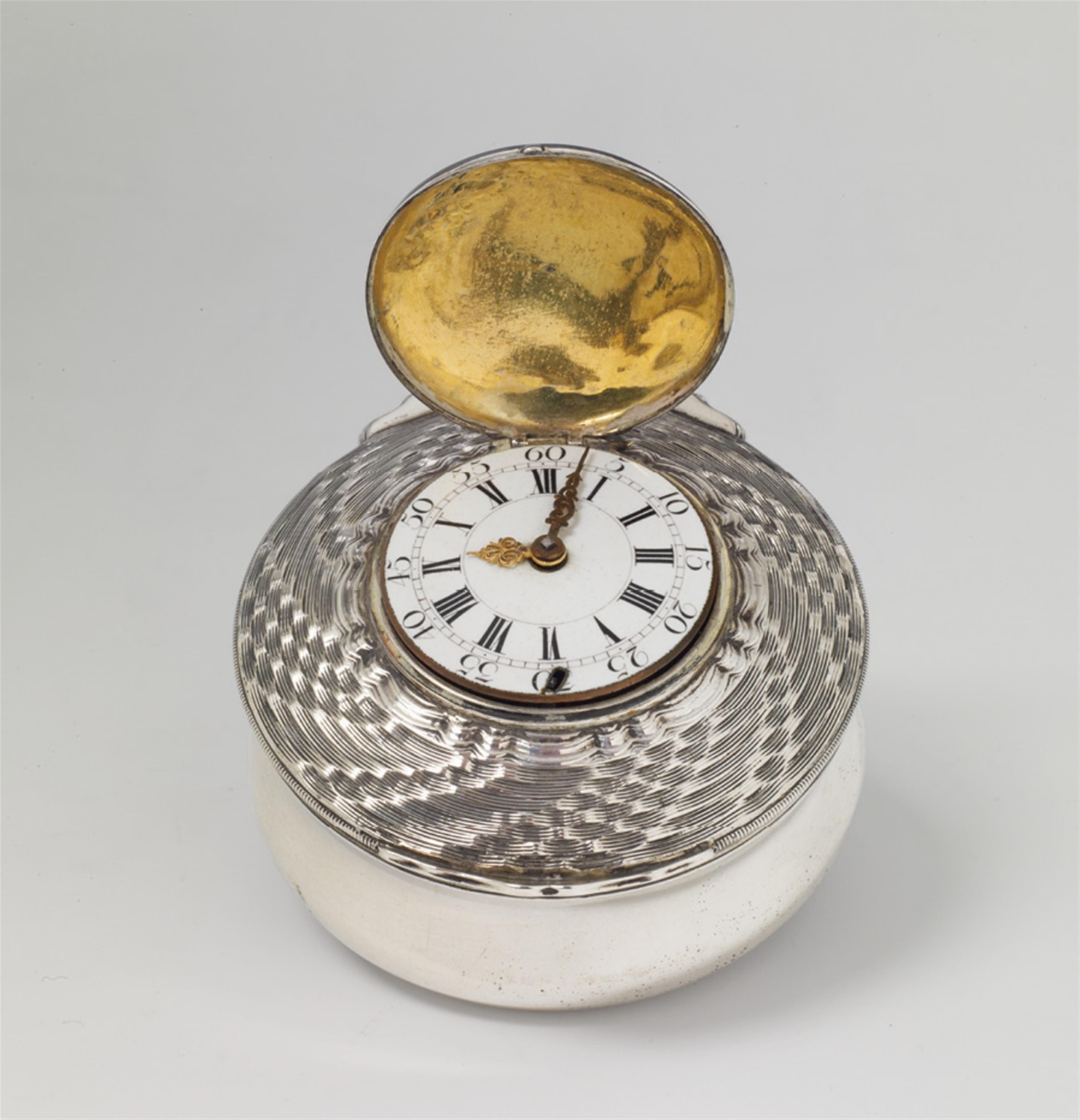 An interior gilt silver snuff box inset with a pocketwatch - image-1