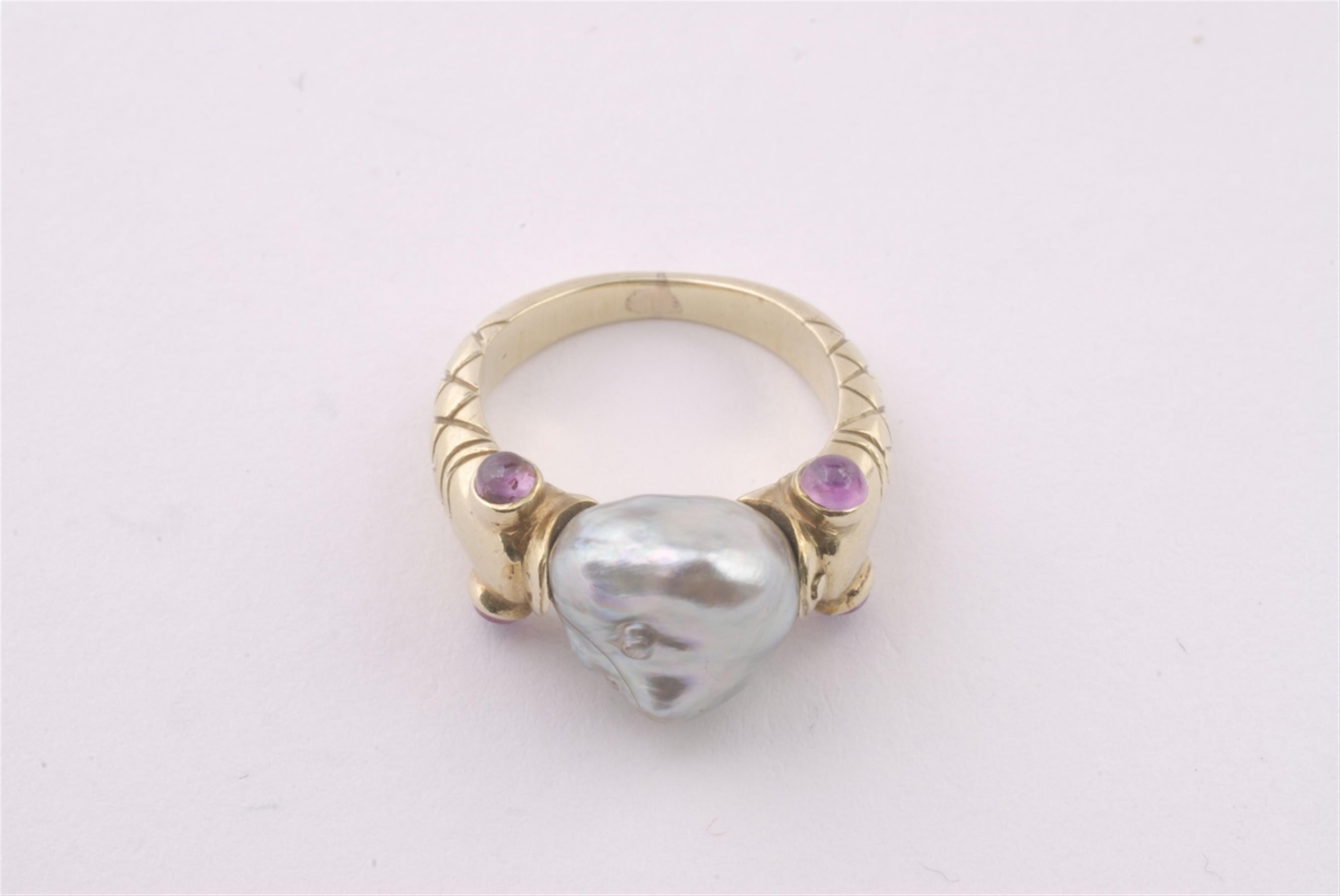 A 14k gold snake ring with a Baroque pearl. - image-1
