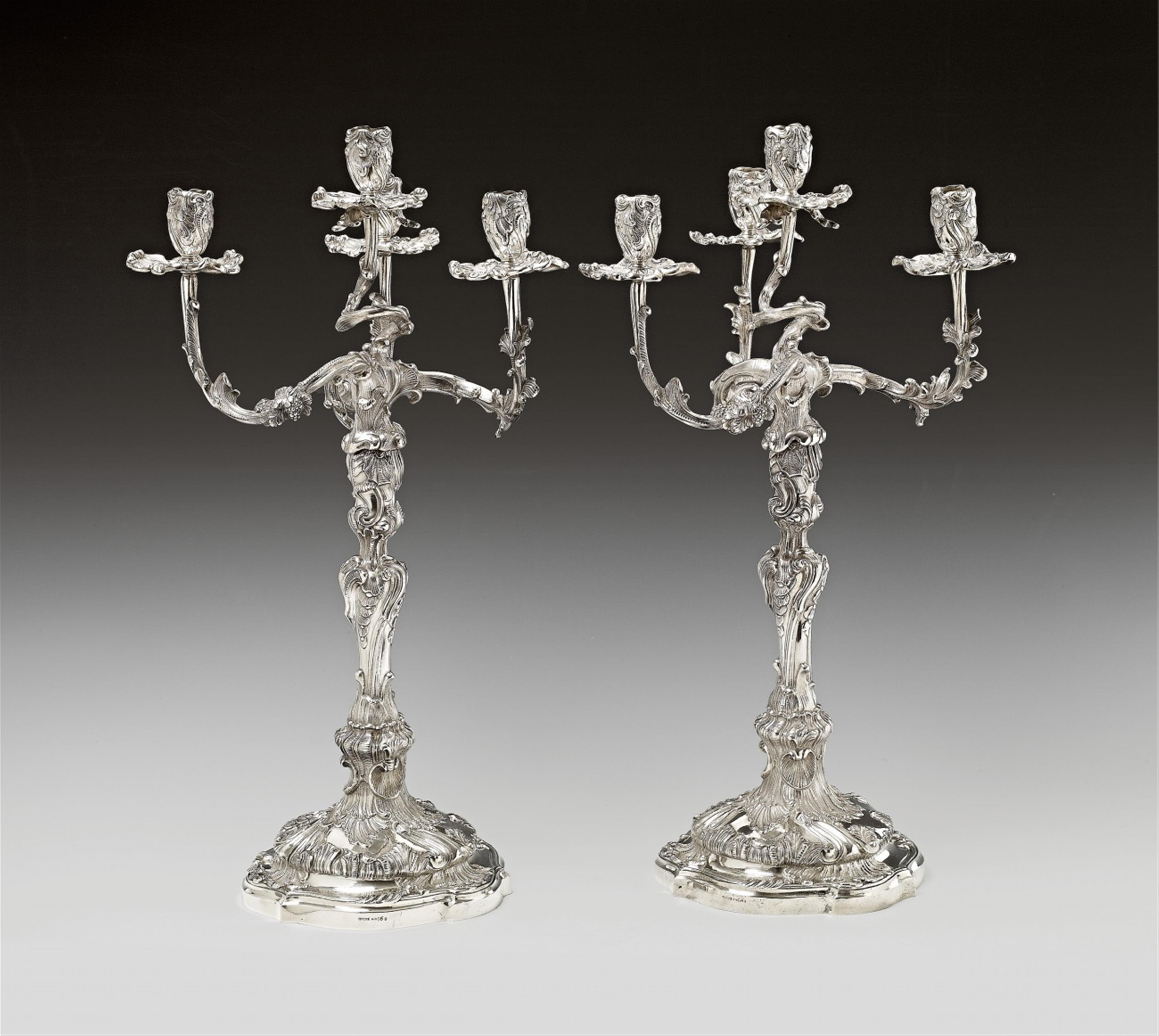 A pair of Dresden silver rococo style candlesticks - image-1