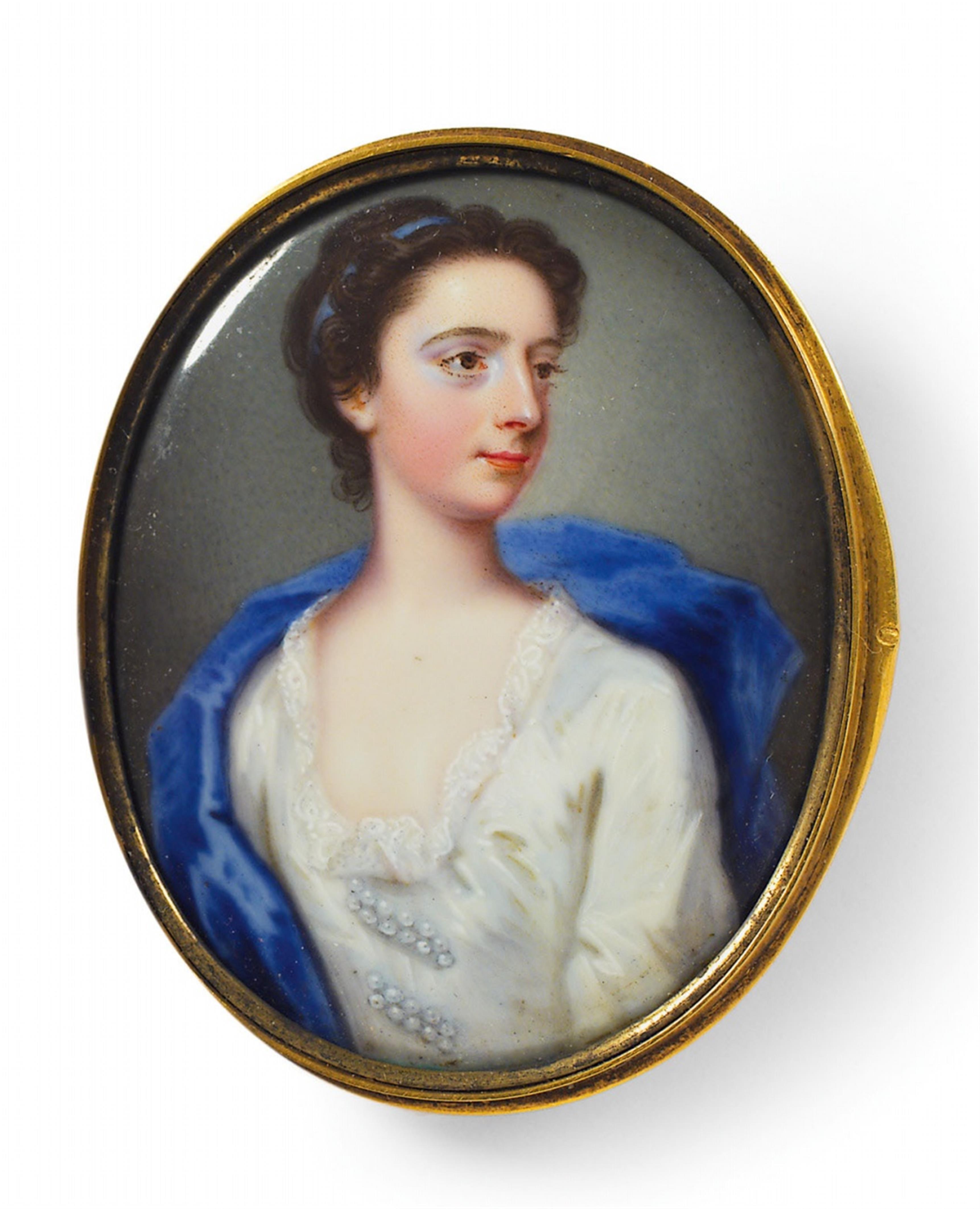A portrait miniature of a young lady in a blue cloak. - image-1