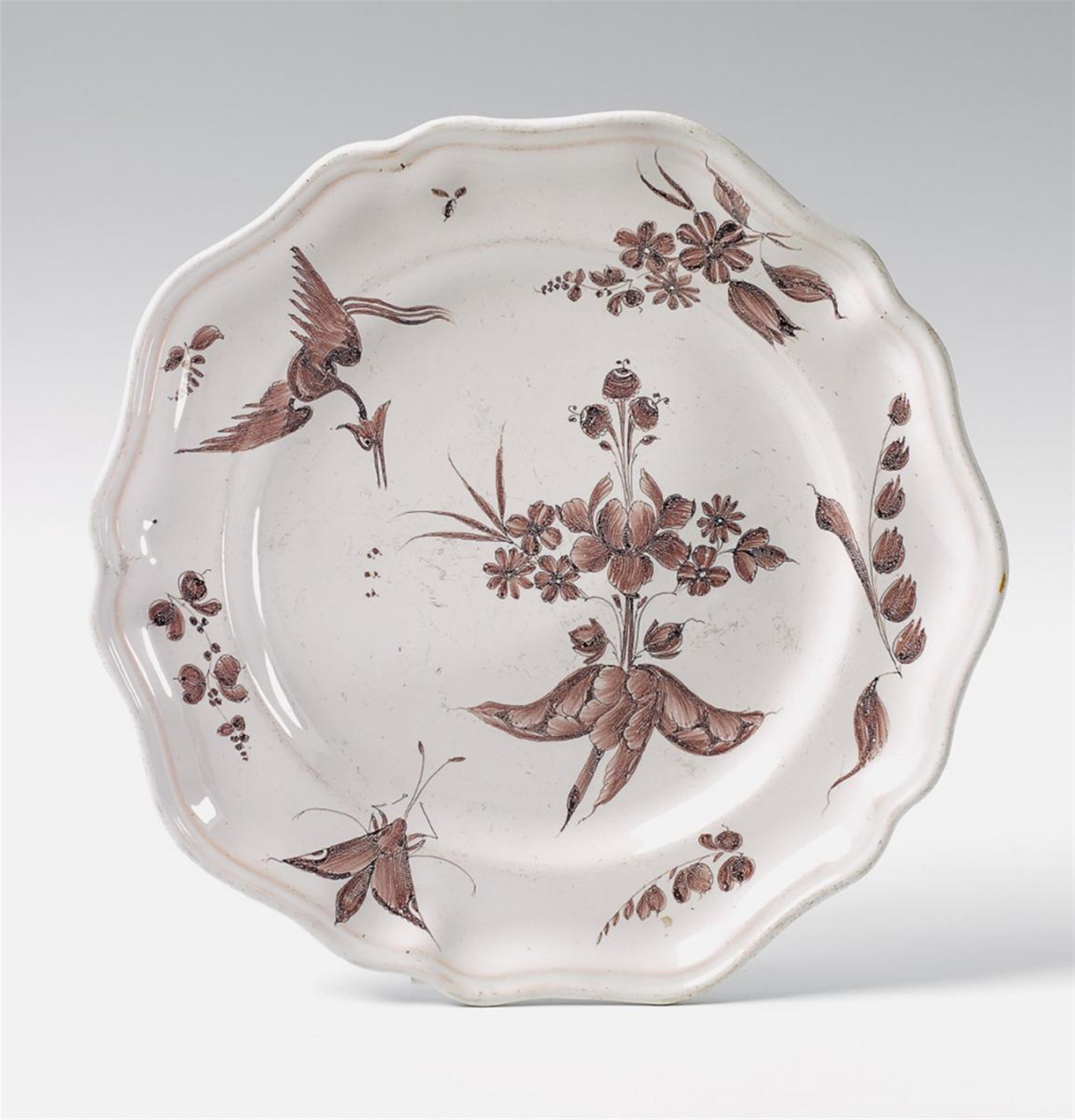 A Lunéville faience dish with cranes and flowers. - image-1