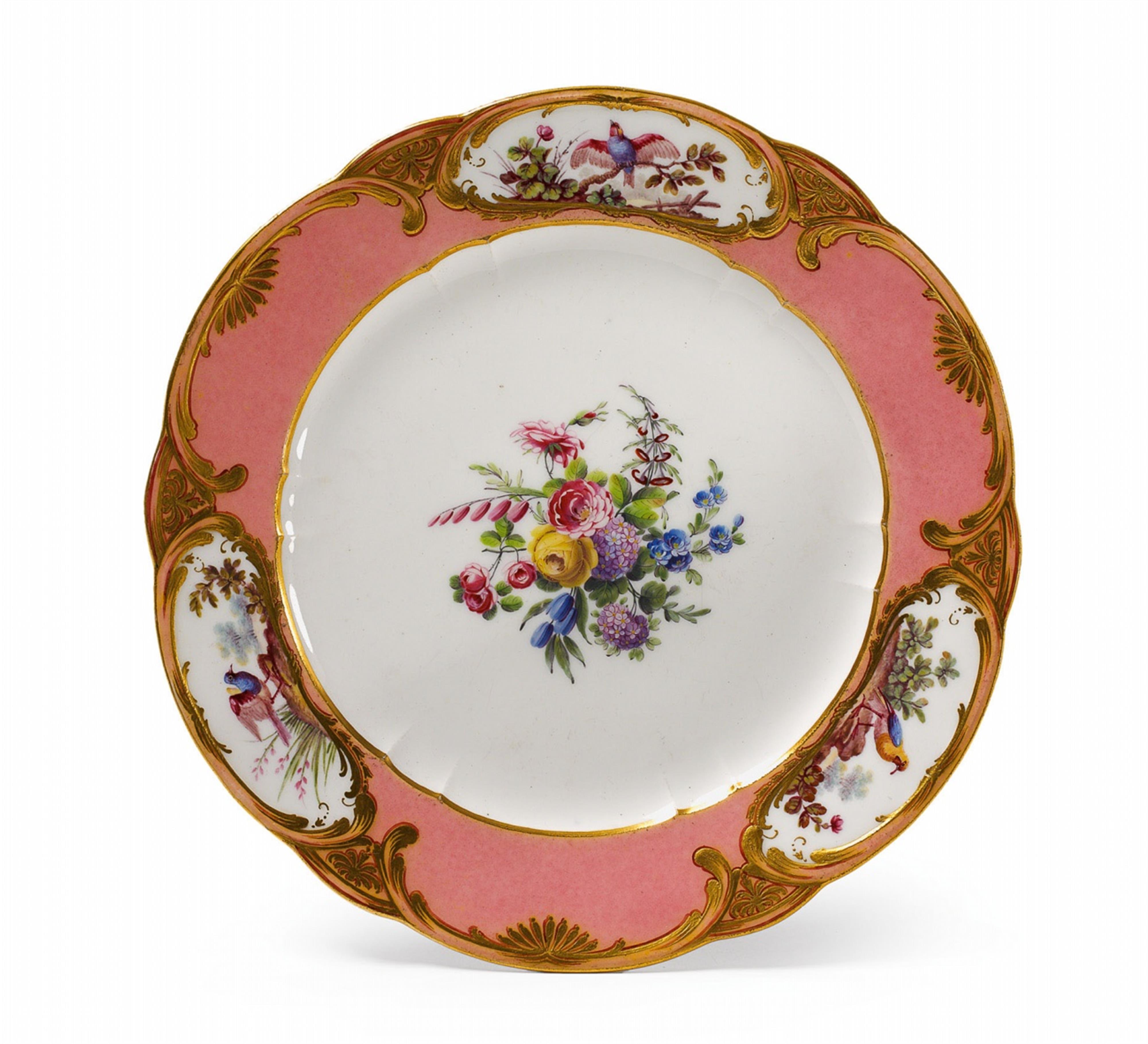 A Sèvres soft paste porcelain plate with floral and exotic bird decor. - image-1