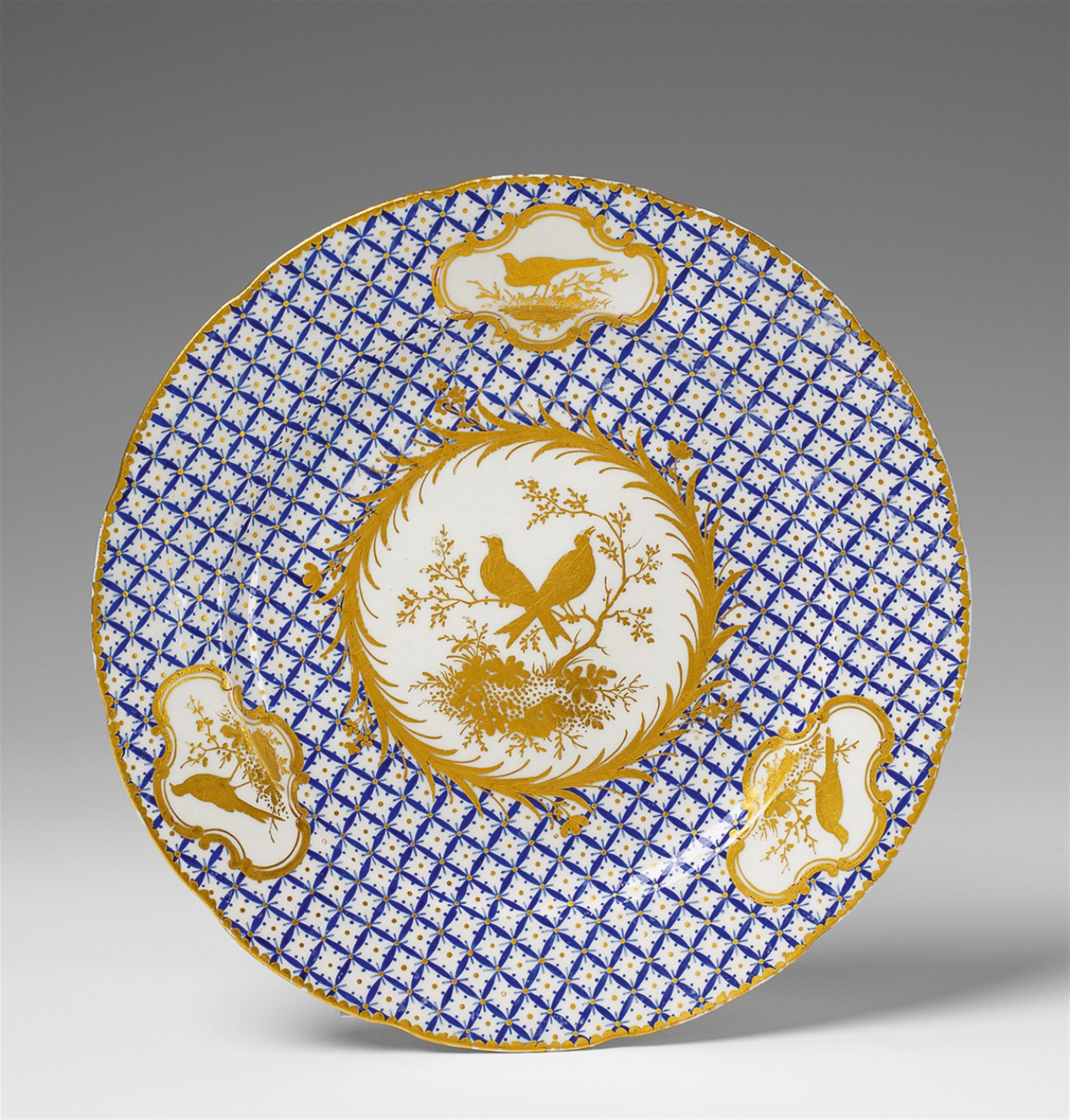 A Tournai porcelain plate with bird decor. - image-1