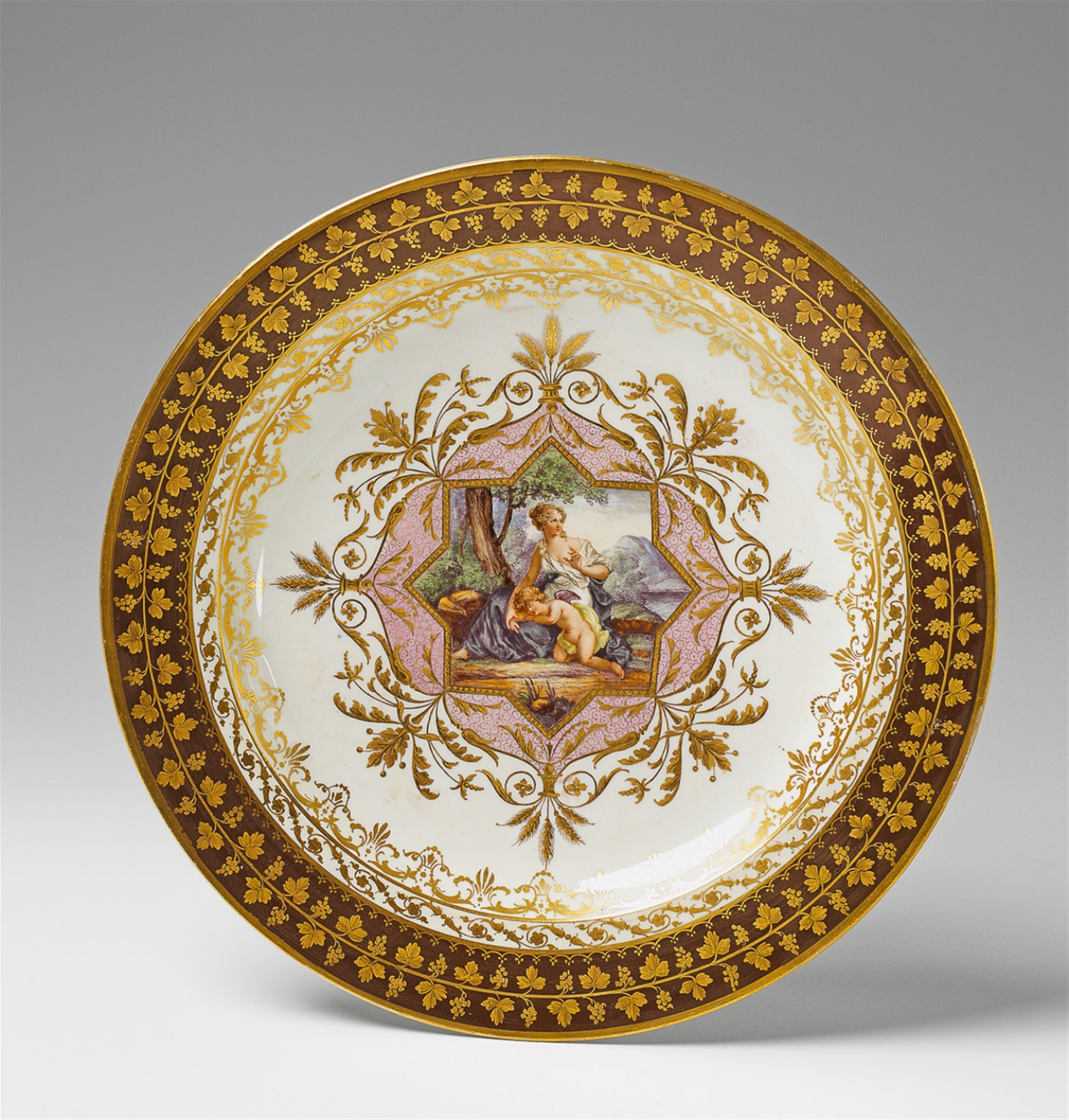 A Vienna porcelain platter decorated with Venus and sleeping Cupid. - image-1
