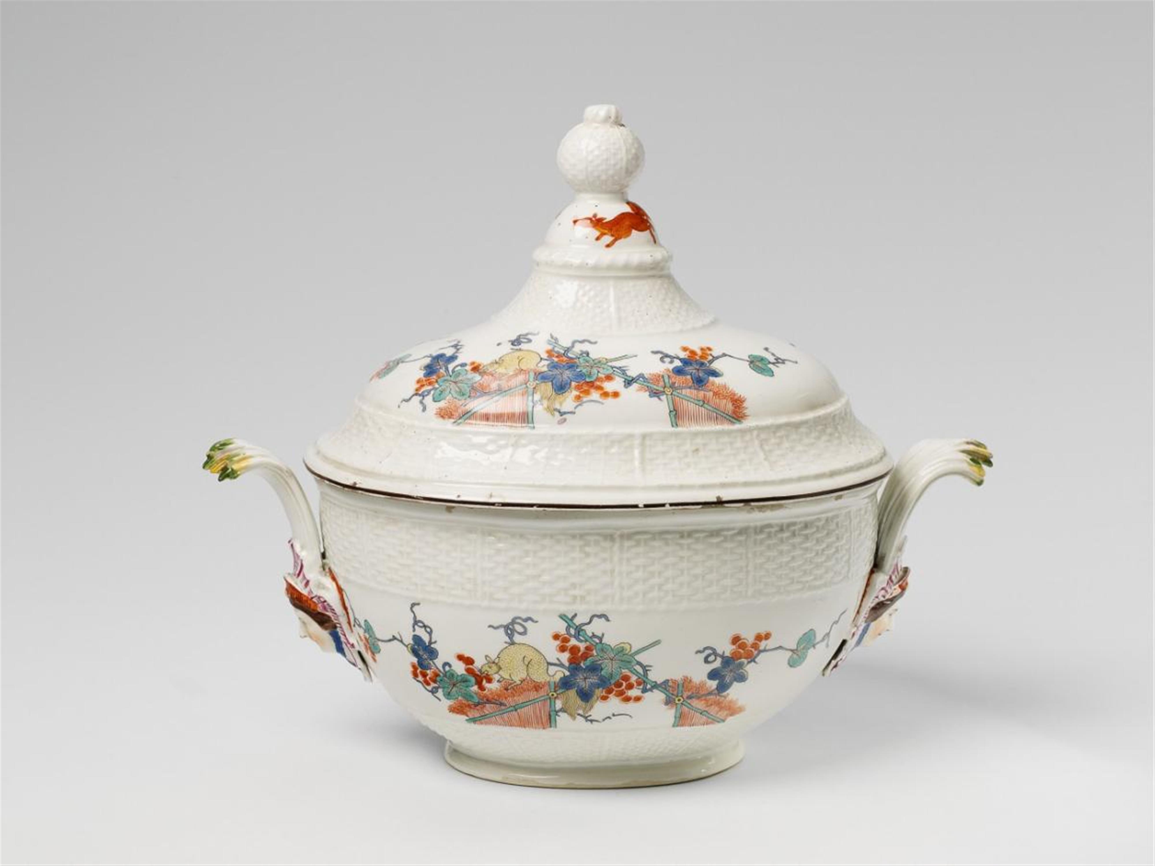 A Meissen porcelain tureen and cover with Kakiemon and ozier relief decor. - image-1