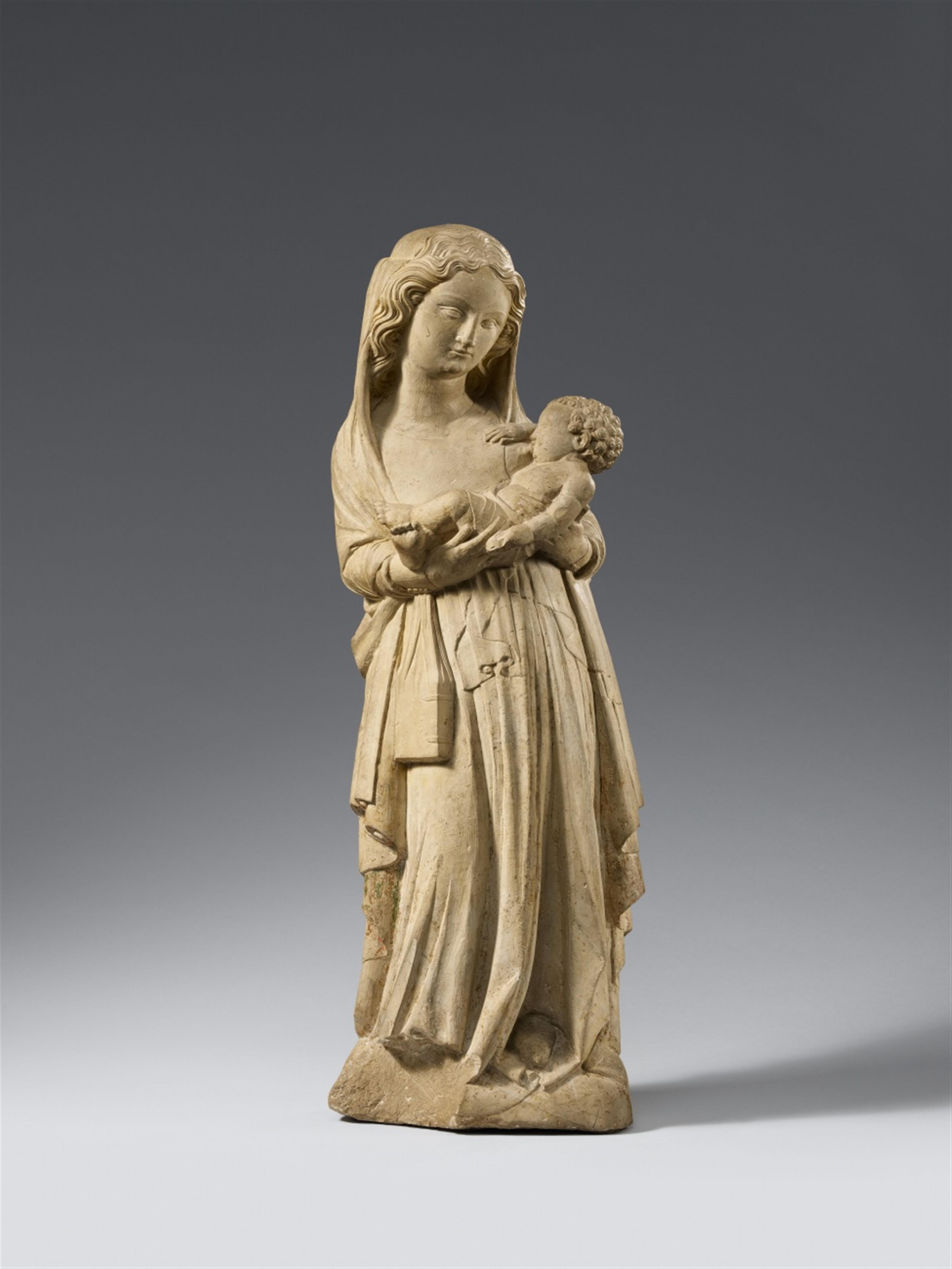 Northern France circa 1370/1380 - A Northern French carved limestone figure of the Virgin and Child, circa 1370/1380. - image-1