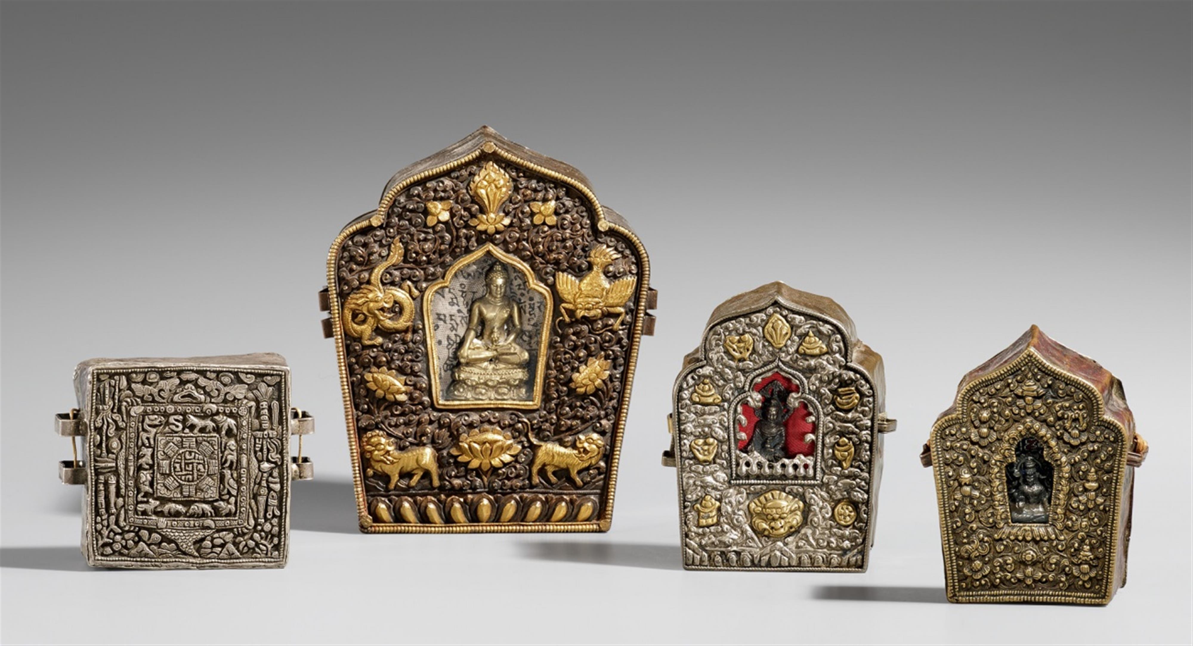 Four Tibetan copper and white alloy ga´u boxes - image-1