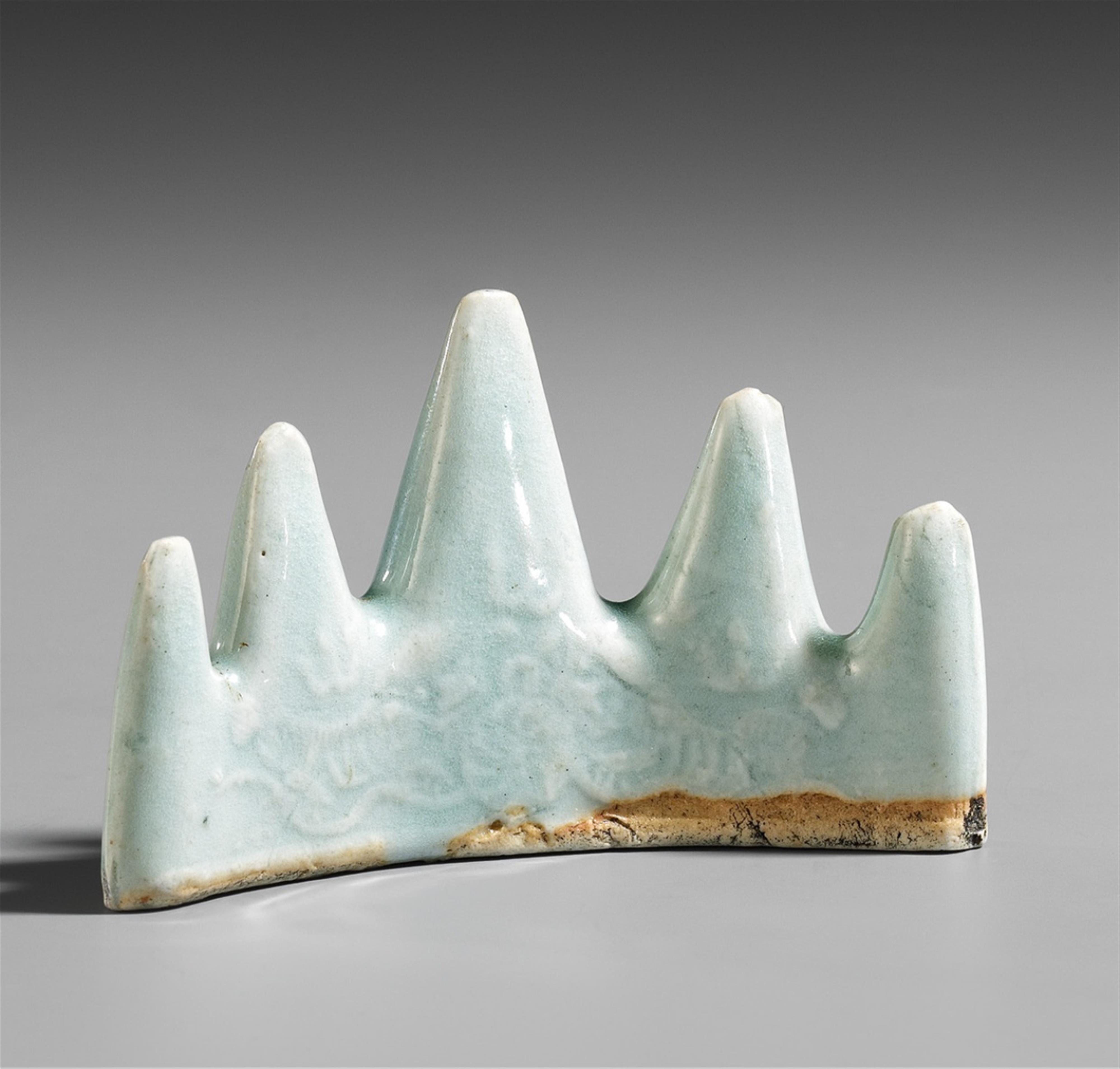 A celadon-glazed mountain-form brush rest. Ming dynasty (1368-1644) - image-2
