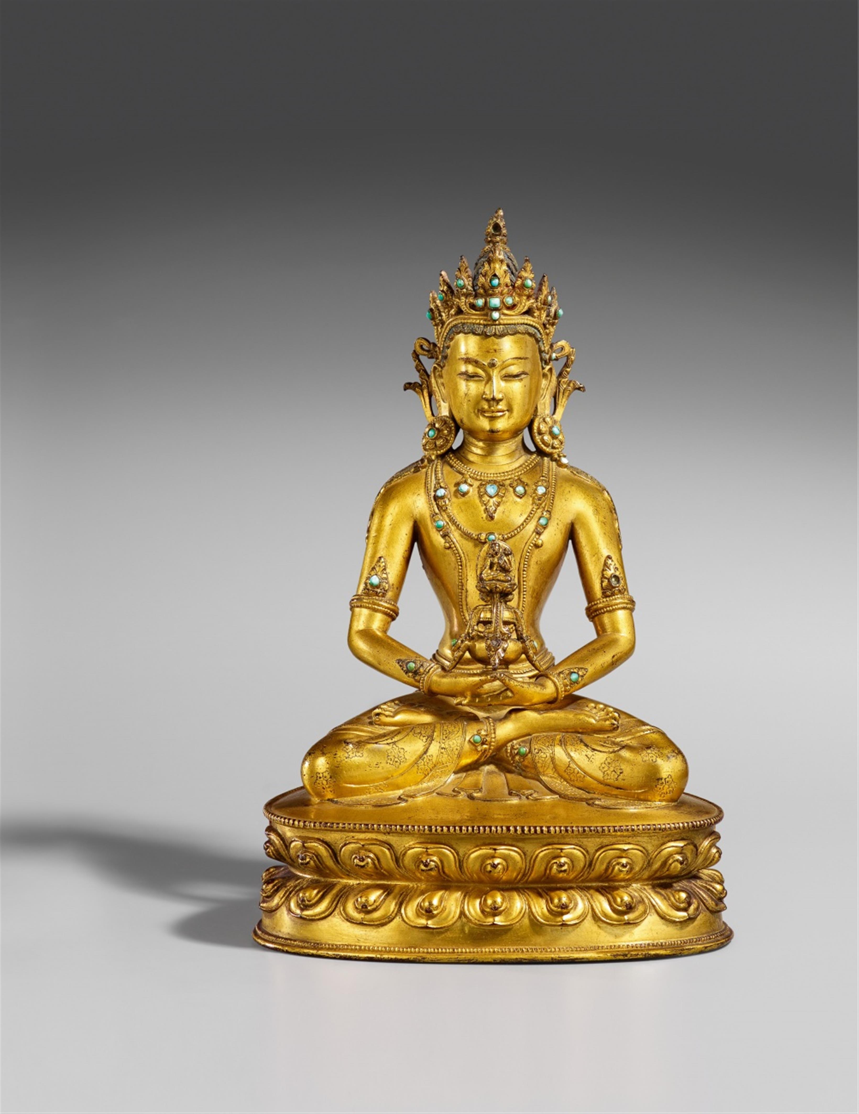 A Tibetan gilt bronze figure of Buddha Amitayus. 15th/16th century - image-1