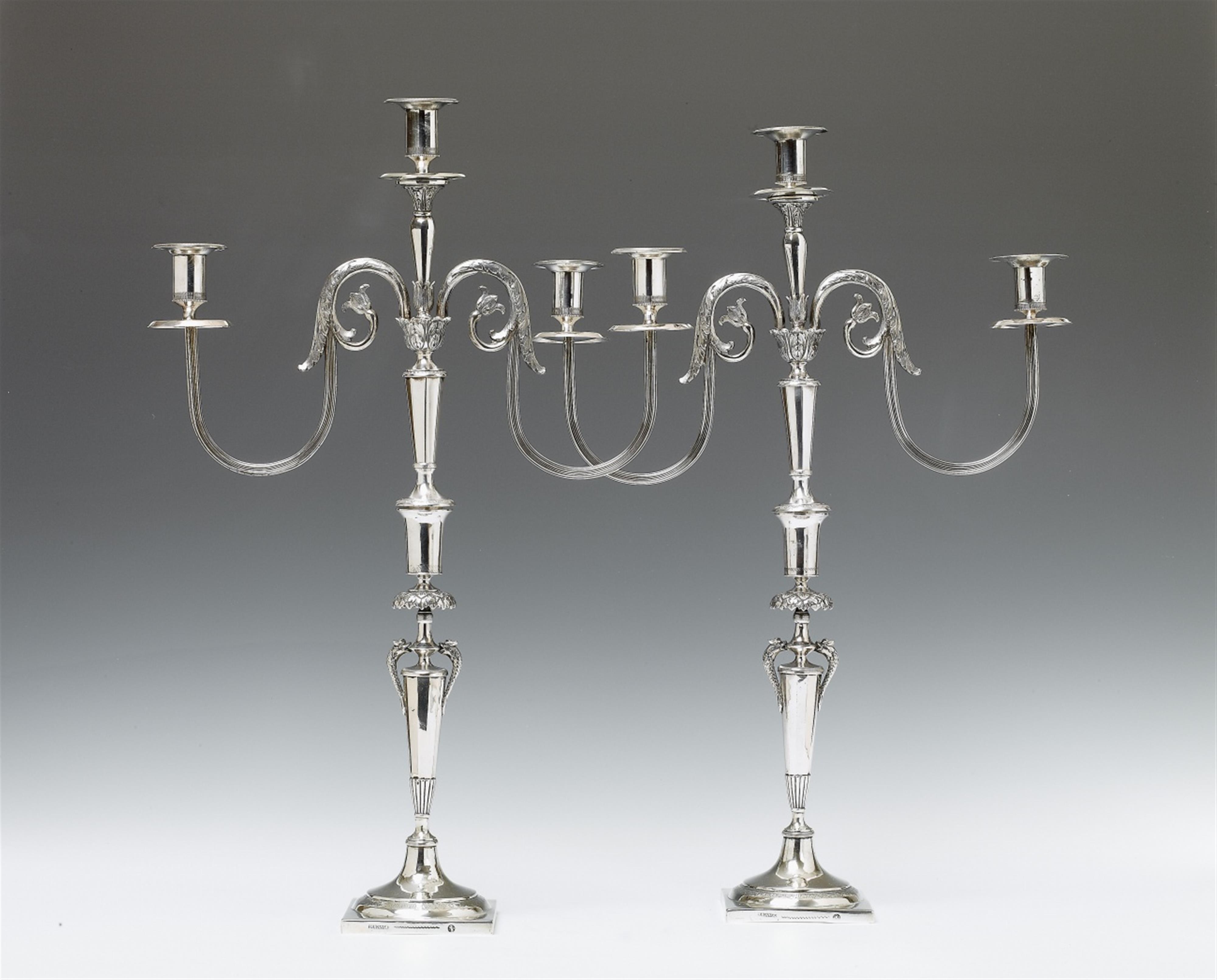 A pair of Berlin silver Neoclassical three-flame candelabra. Marks of Leberecht Fournier, 1817 - 19. - image-1