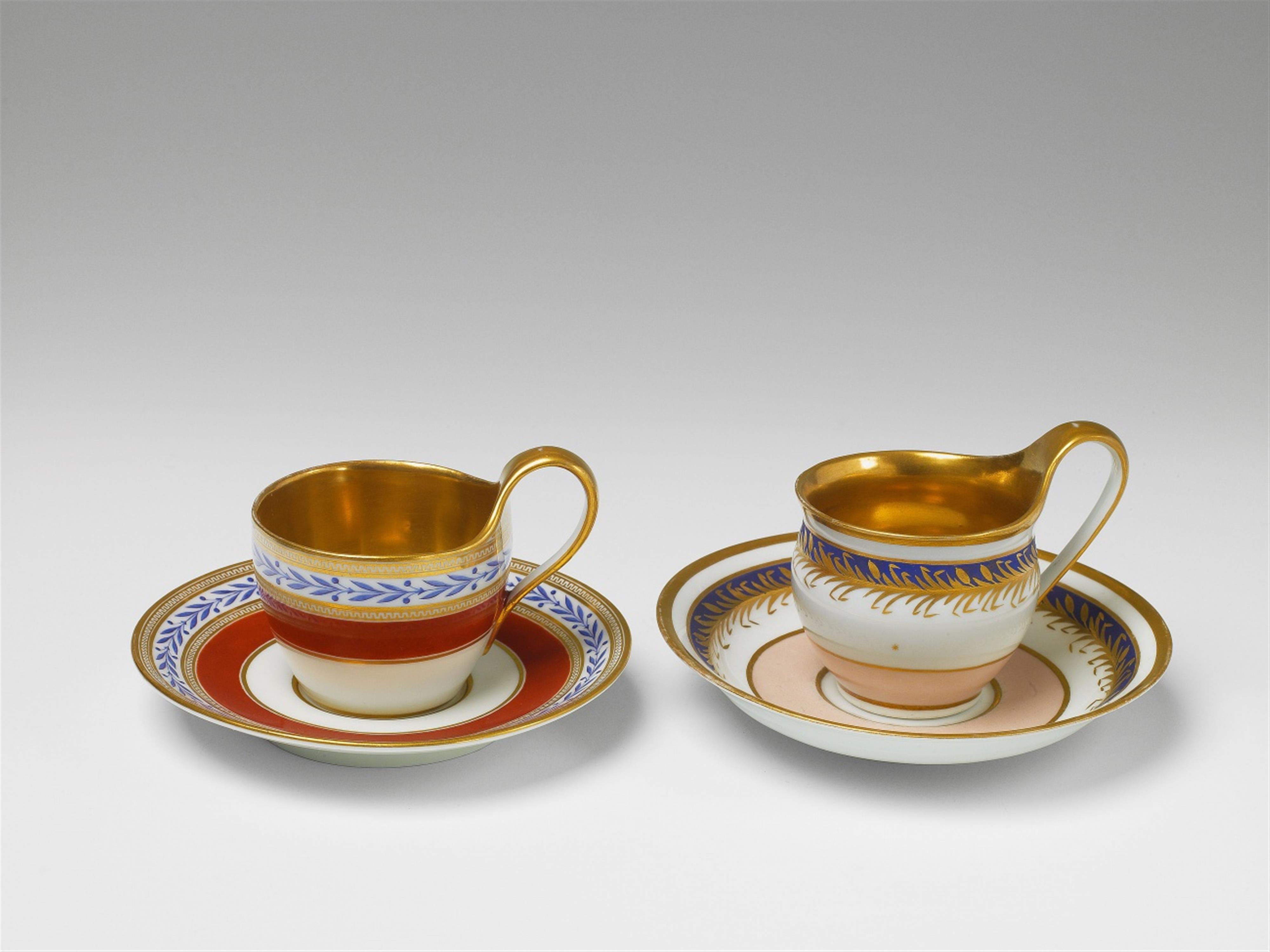 Two Berlin KPM Neoclassical cups and saucers - image-1