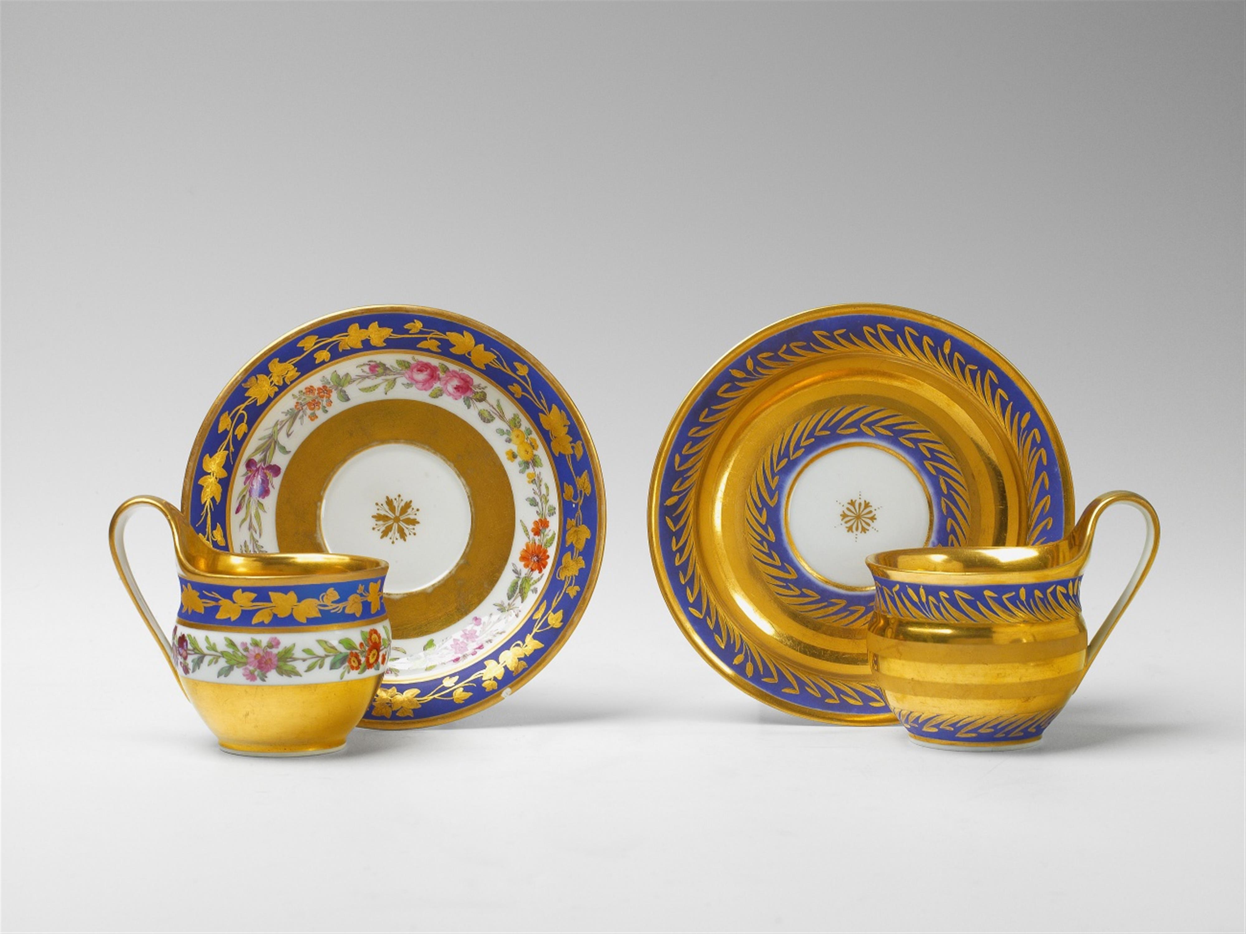 Two Berlin KPM Neoclassical cups and saucers - image-1
