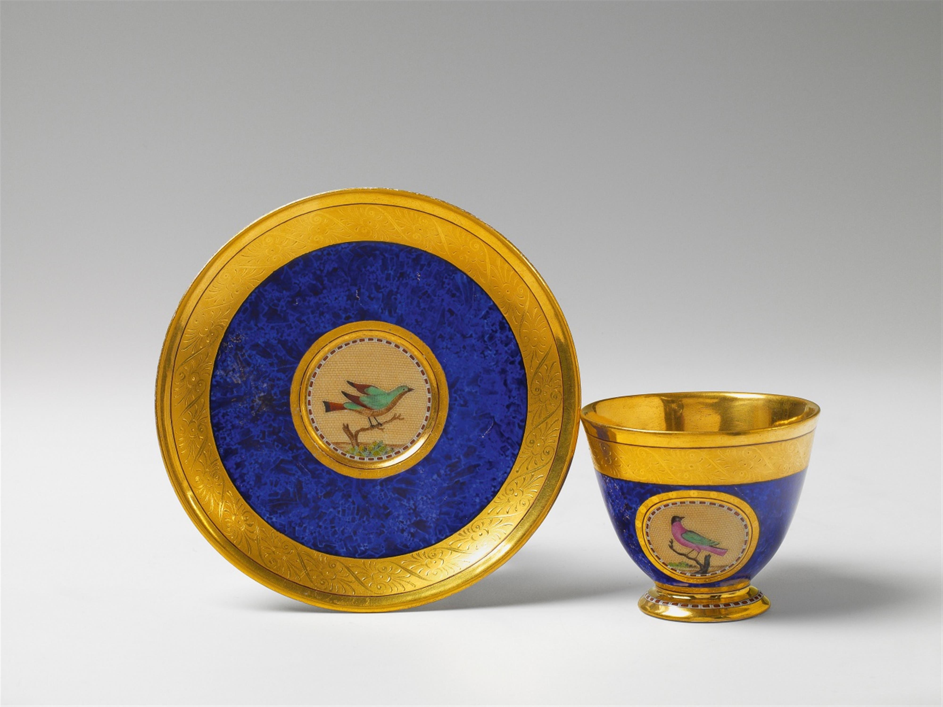 A Berlin KPM porcelain cup and saucer with lapis lazuli ground - image-1