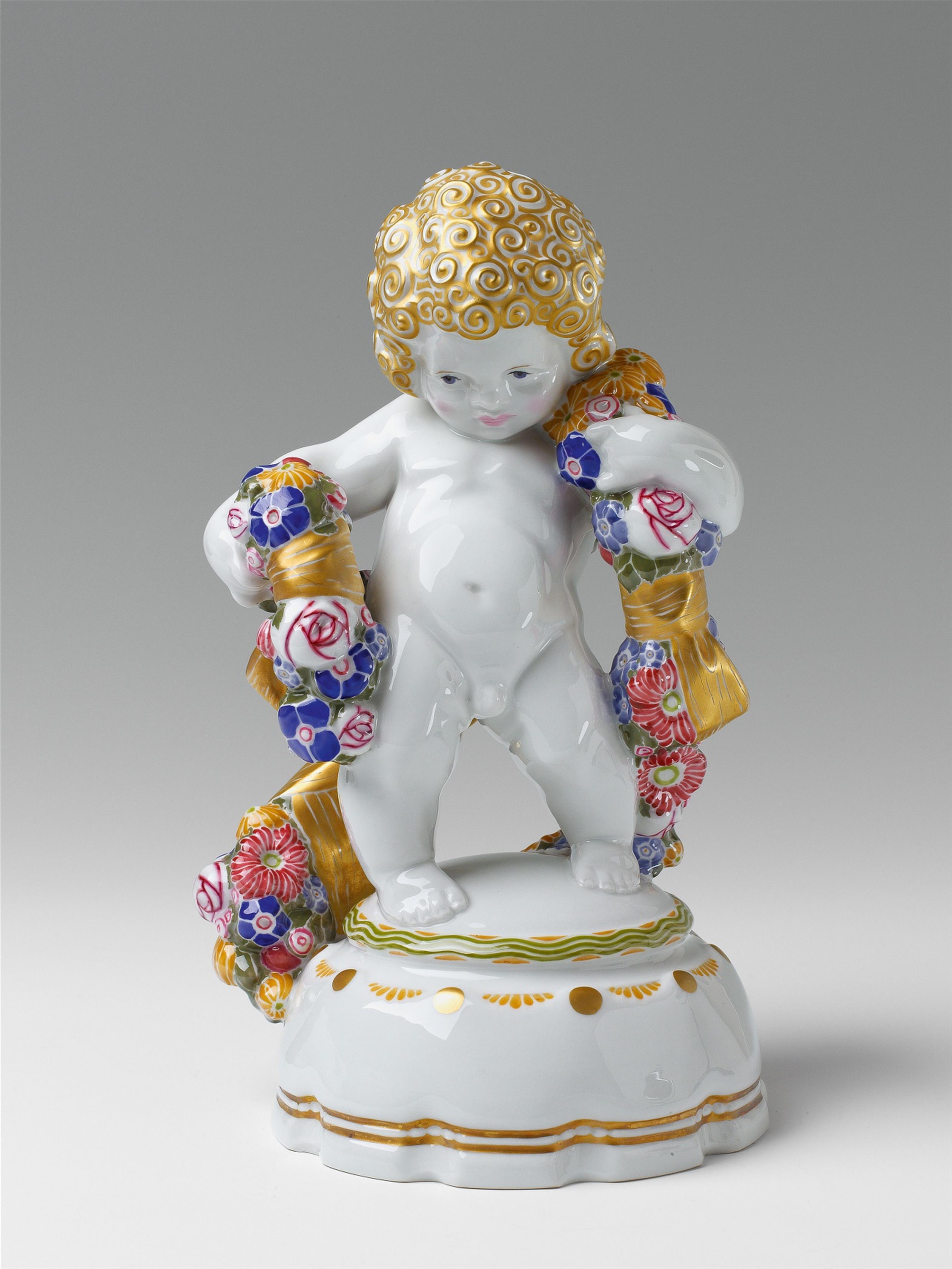 A large KPM porcelain figure of a putto with a garland - image-1