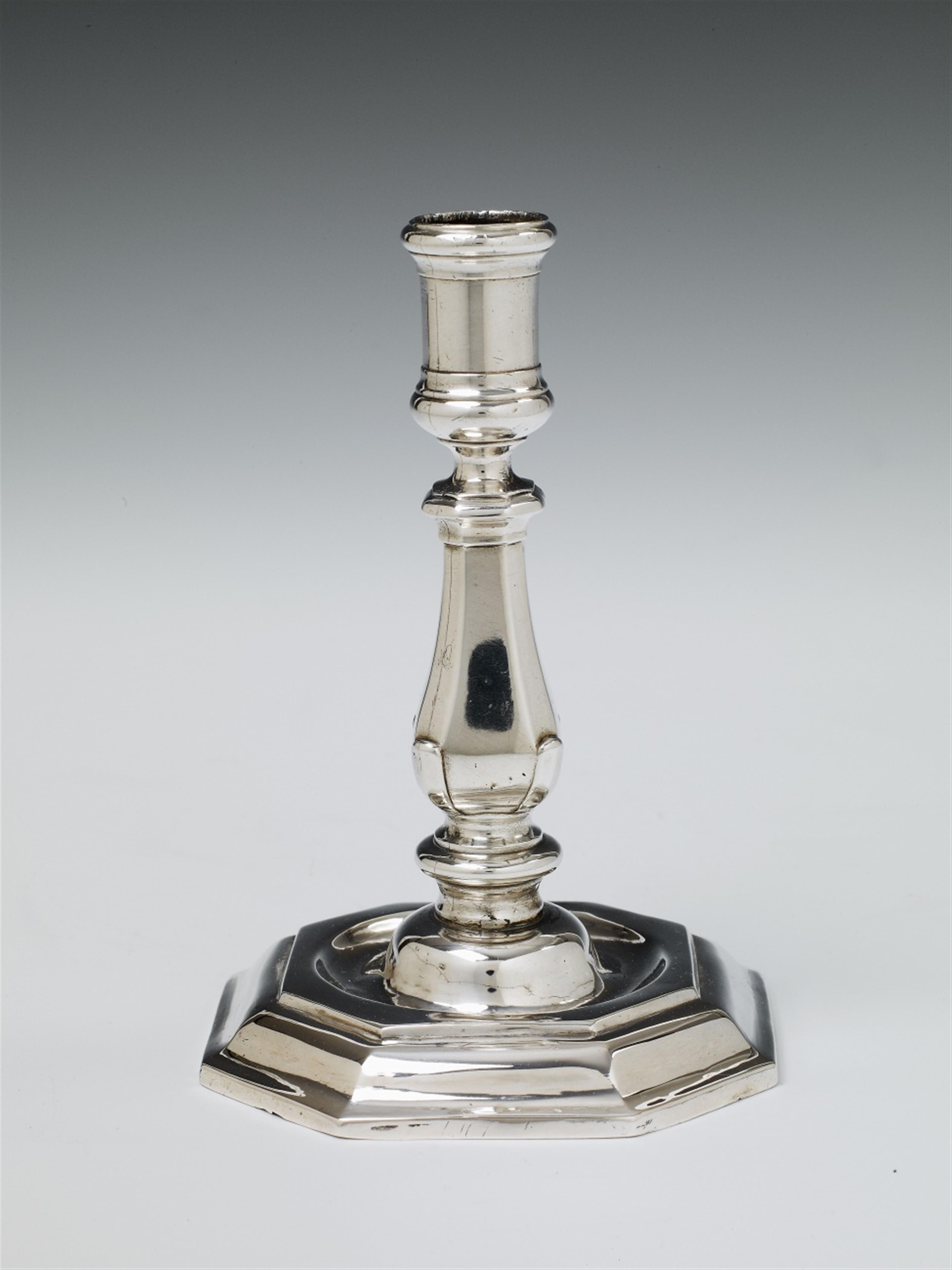 A Berlin silver candlestick. Of a similar type to the candle holders made by Christian Lieberkühn for the dinner service of Frederick II. Illegible marks, presumably Berlin ca. 1740/50. - image-1