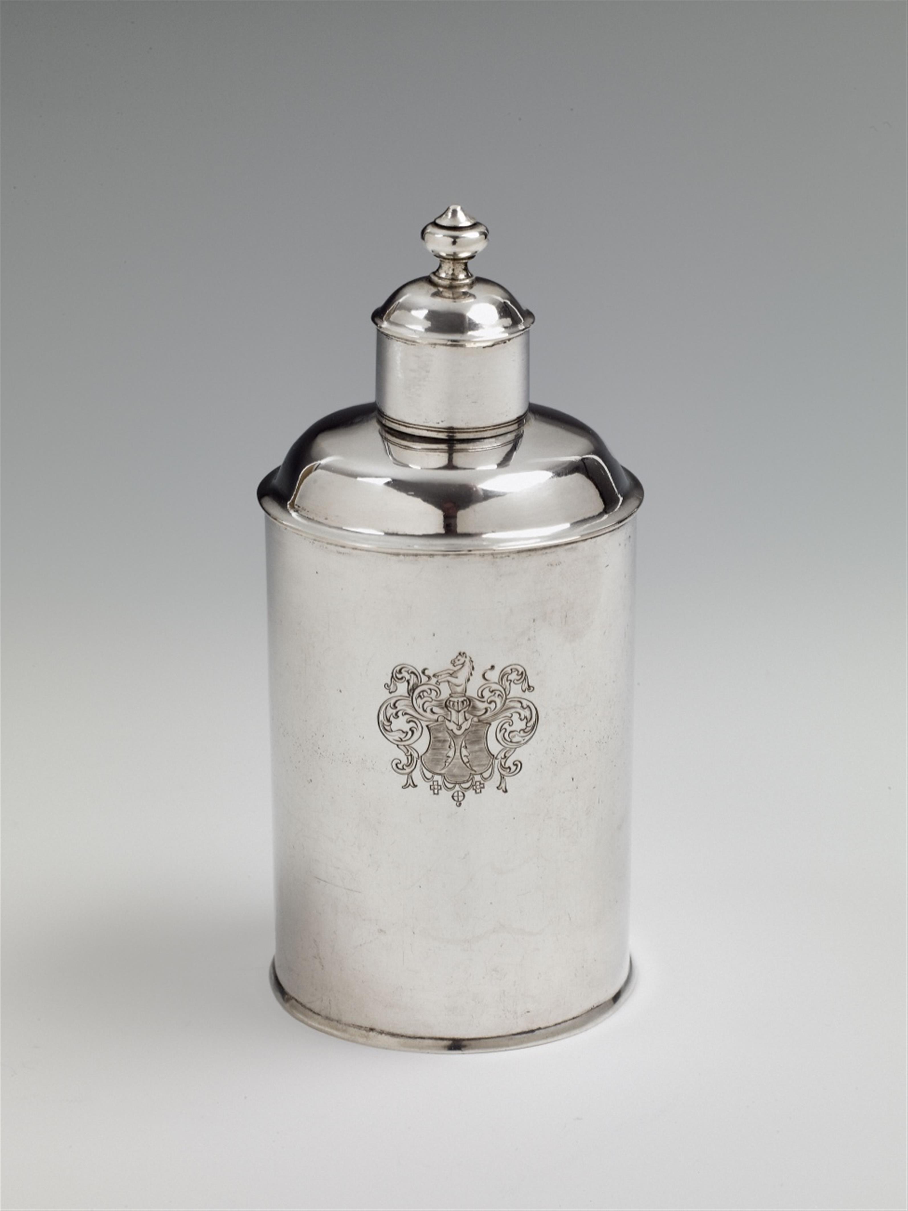 A Berlin silver tea caddy. The body engraved with a coat-of-arms, the base monogrammed "H.v.T.". Marks of Johann Bernhard or Martin Friedrich Müller, ca. 1780. - image-1