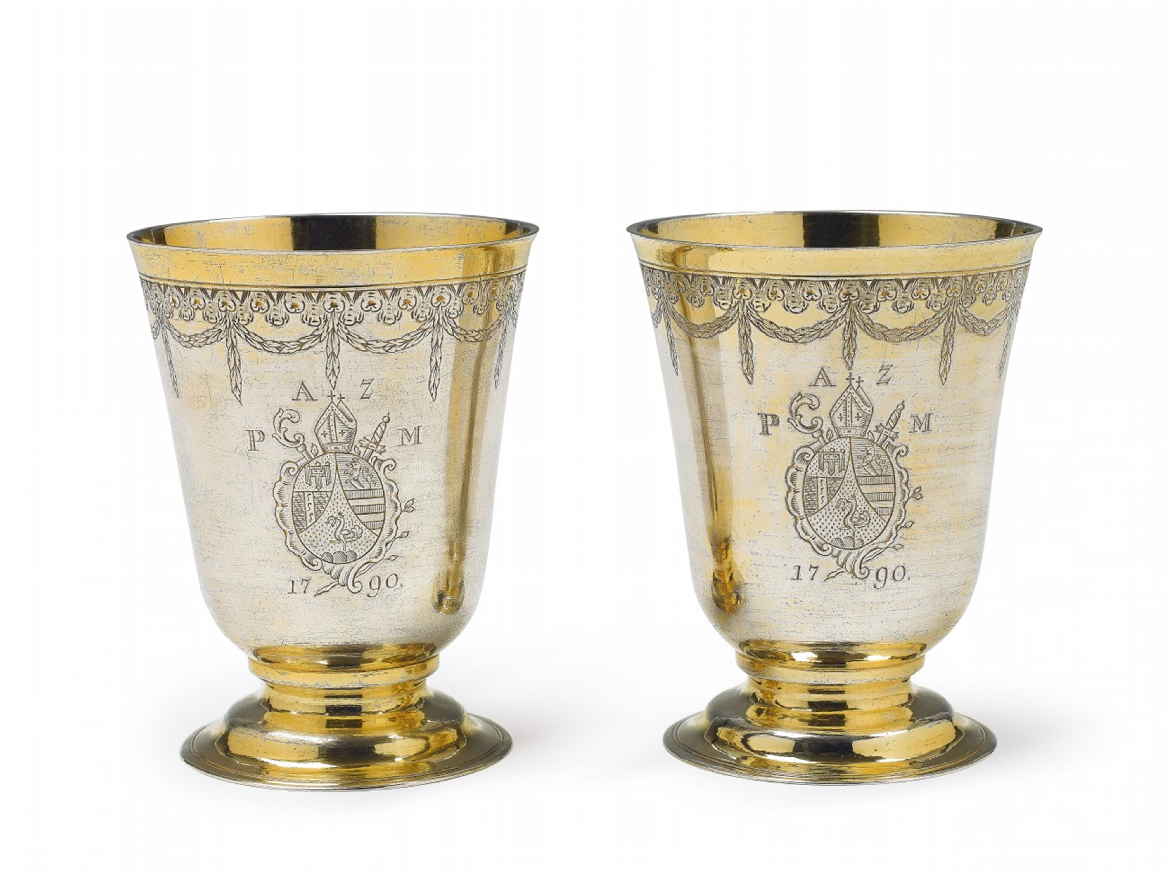 An important pair of Augsburg silver gilt abbot's beakers - image-1