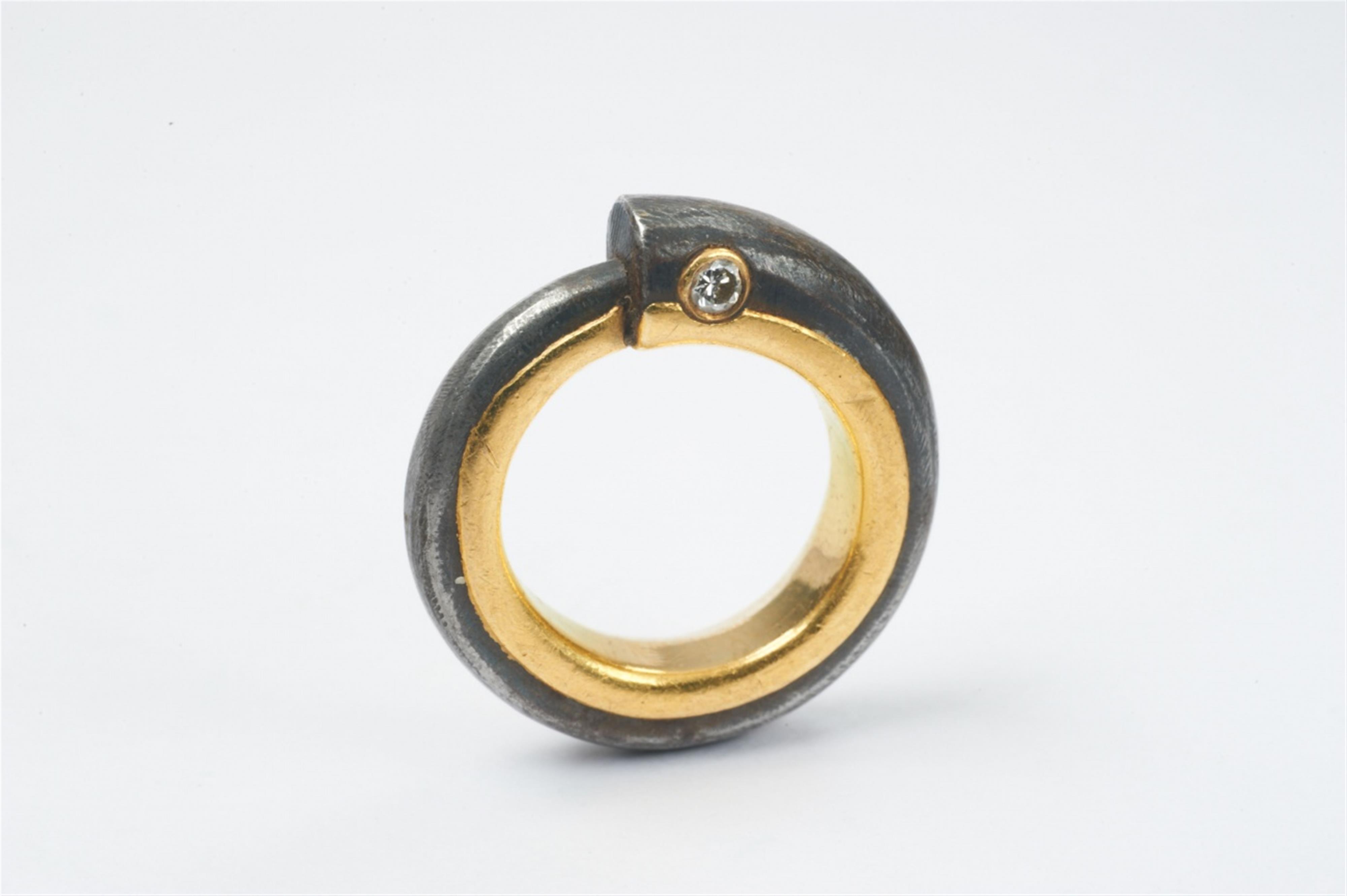 A iron, gold and diamond snake ring by Falko Marx, Cologne - image-1