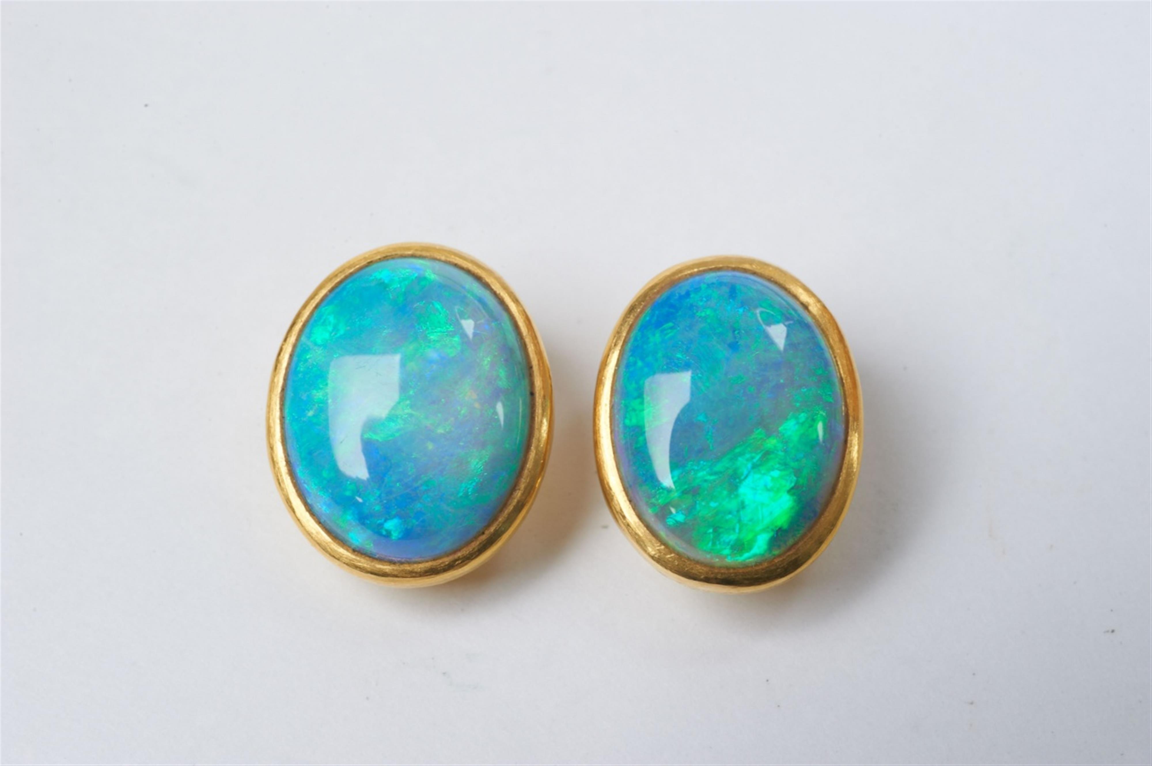A pair of 21k gold and Australian boulder opal clip earrings by Dagmar Stühler - image-1