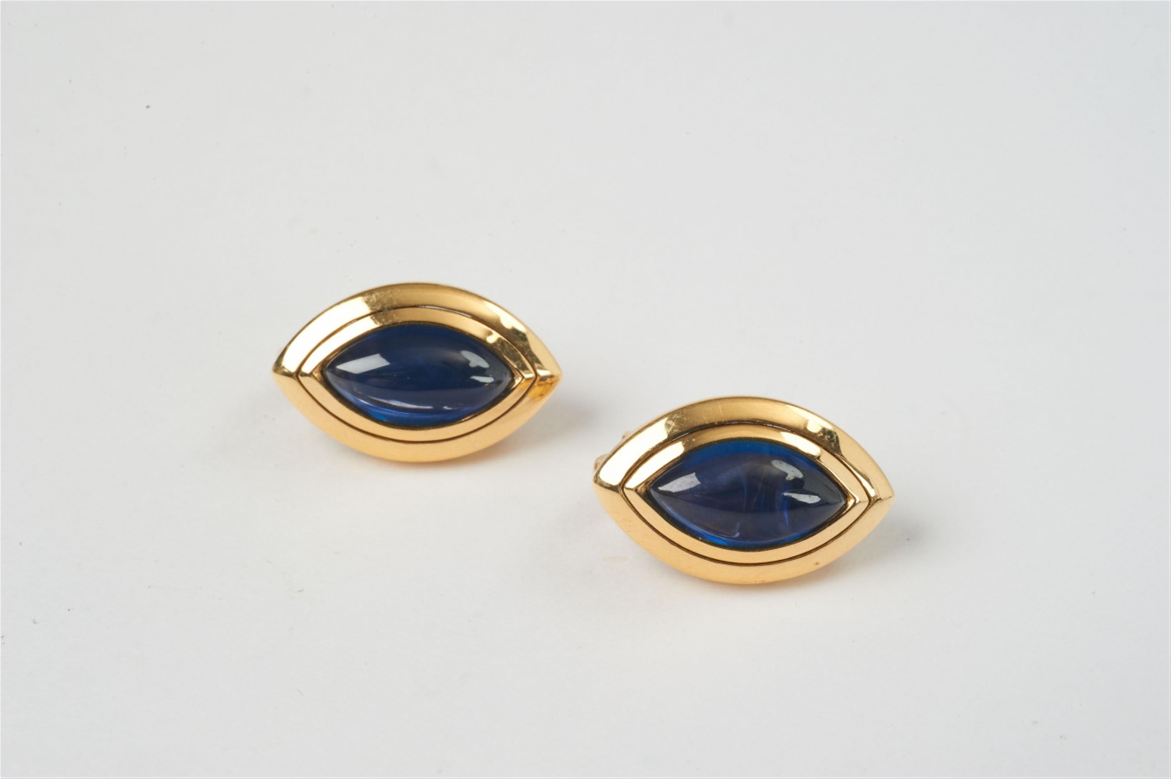 A pair of 18k gold and sapphire cabochon ear clips by jeweller Hemmerle - image-1