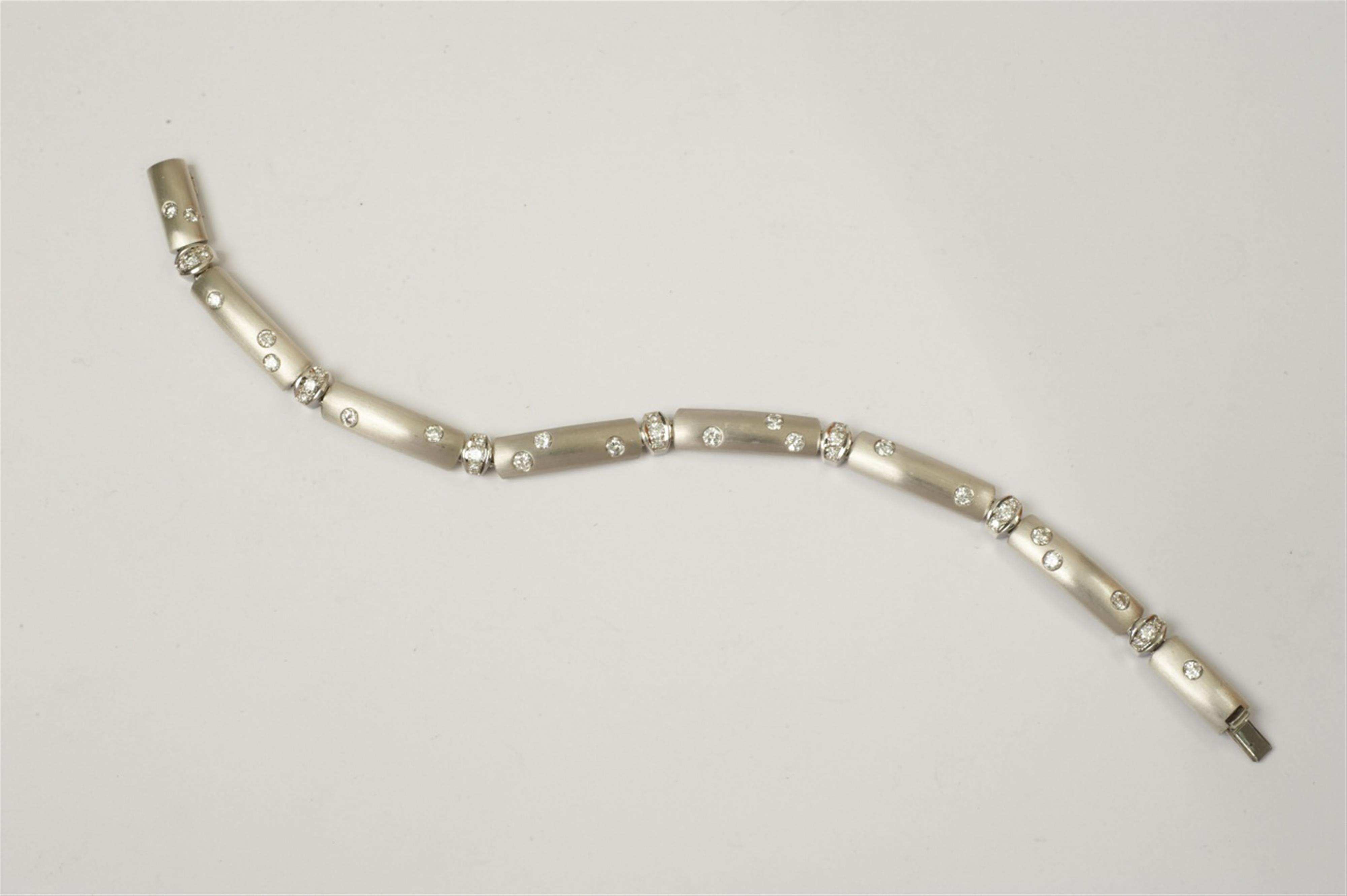 A platinum and diamond bracelet - image-1