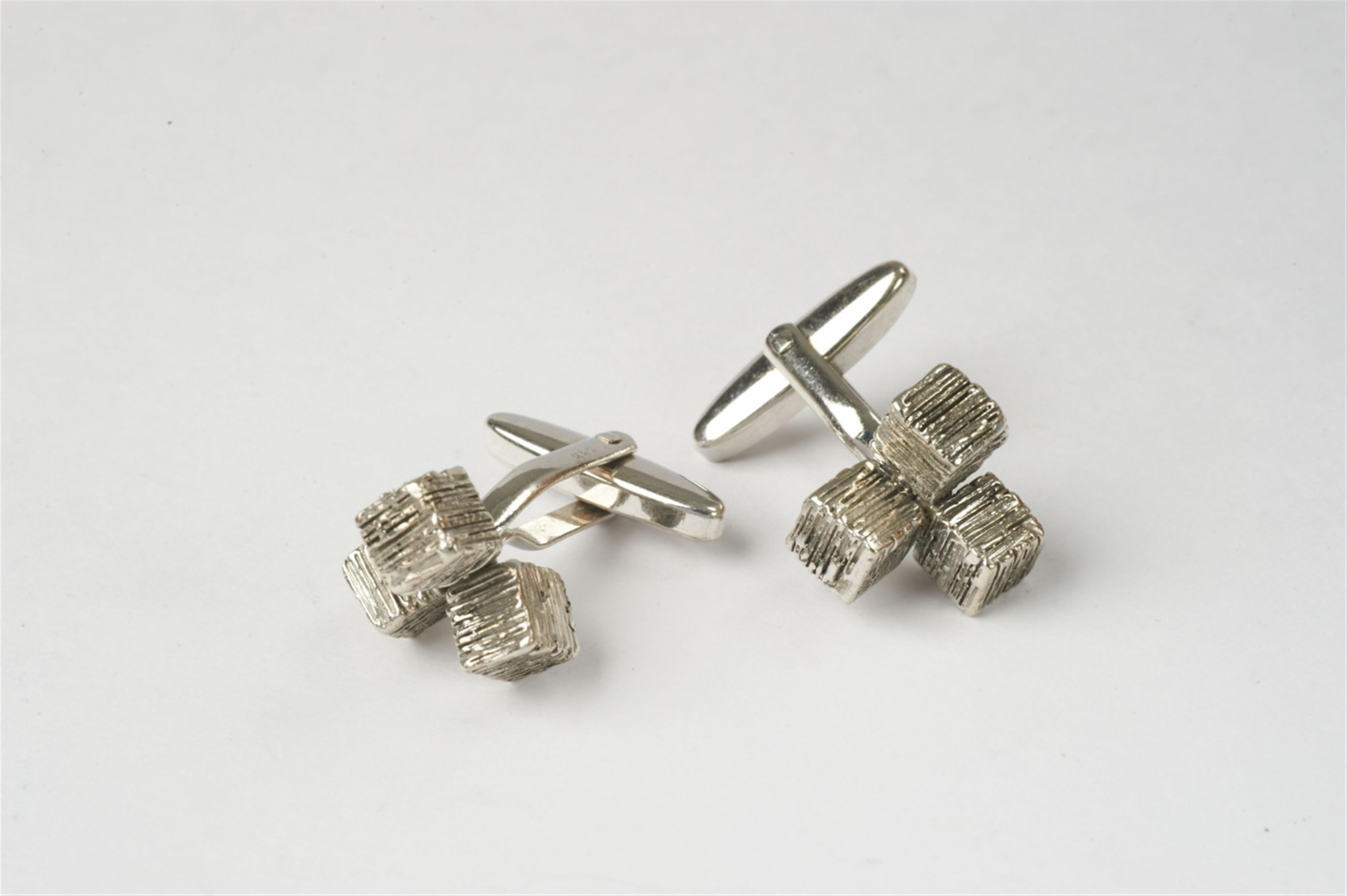 A pair of 14k white gold cuboid cufflinks by John & Ursula Perry - image-1