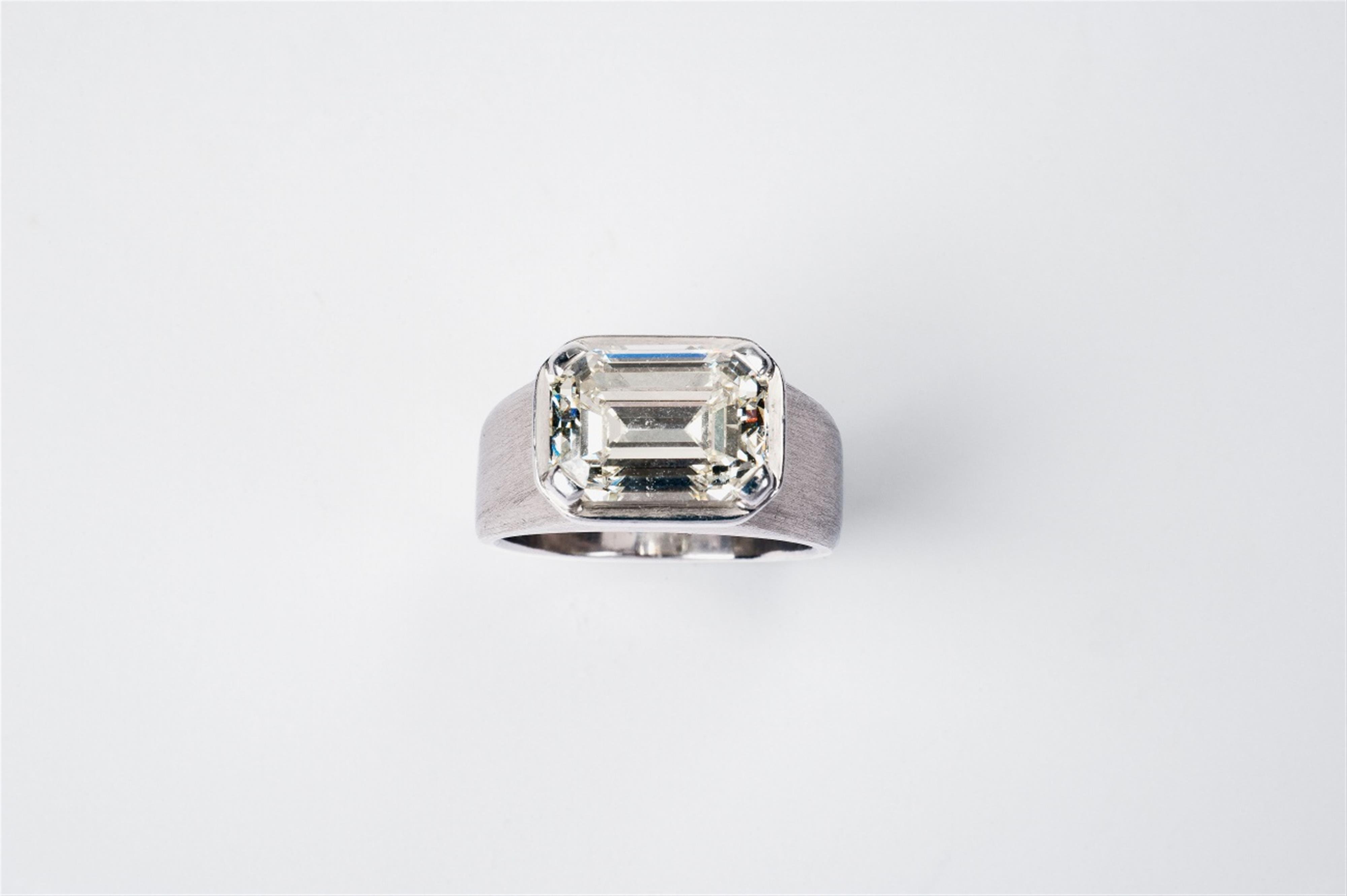 A platinum emerald-cut diamond solitaire ring by Gebhard Duve - image-1