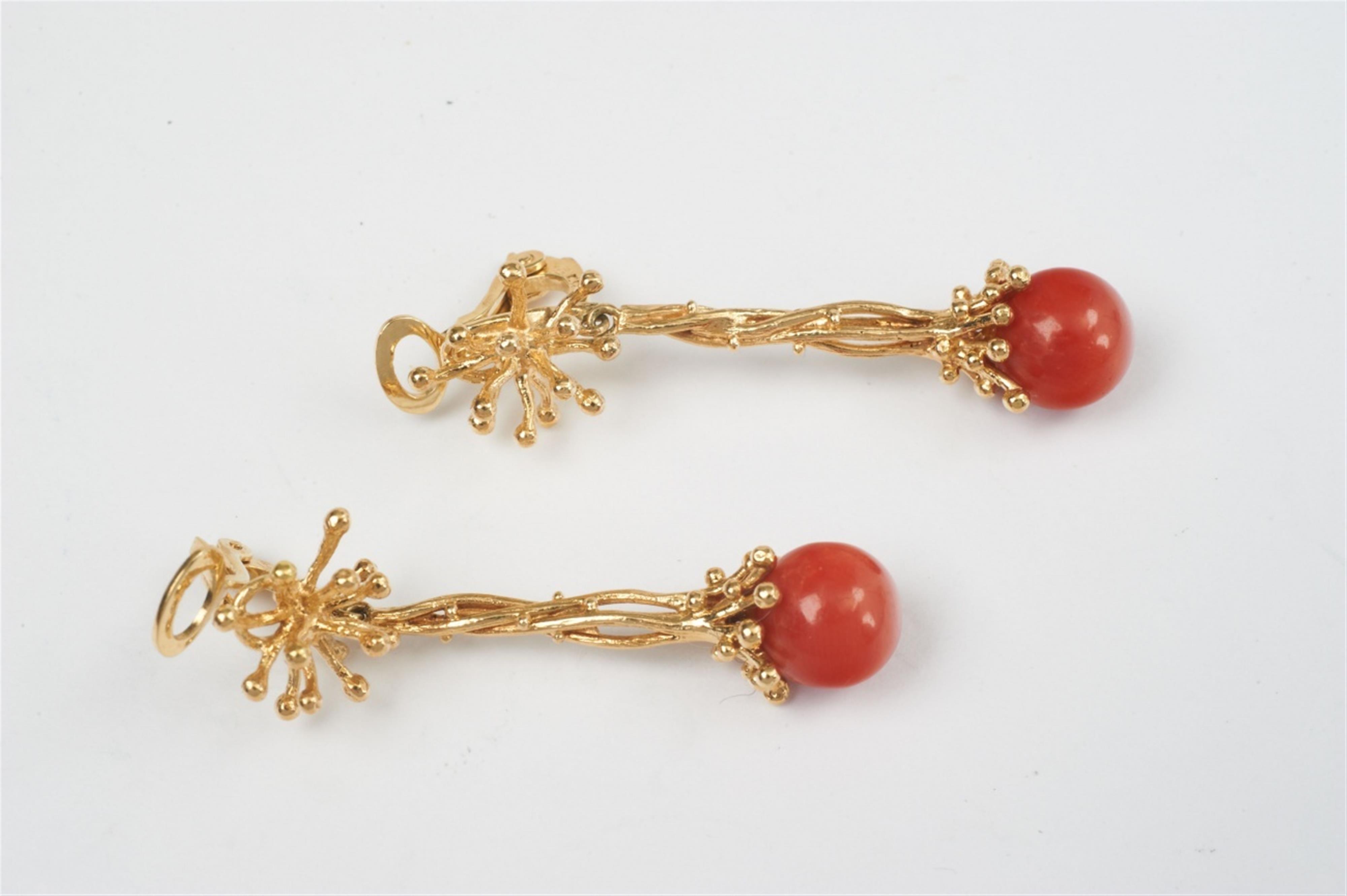 A pair of 14k gold and coral pendant earrings - image-1