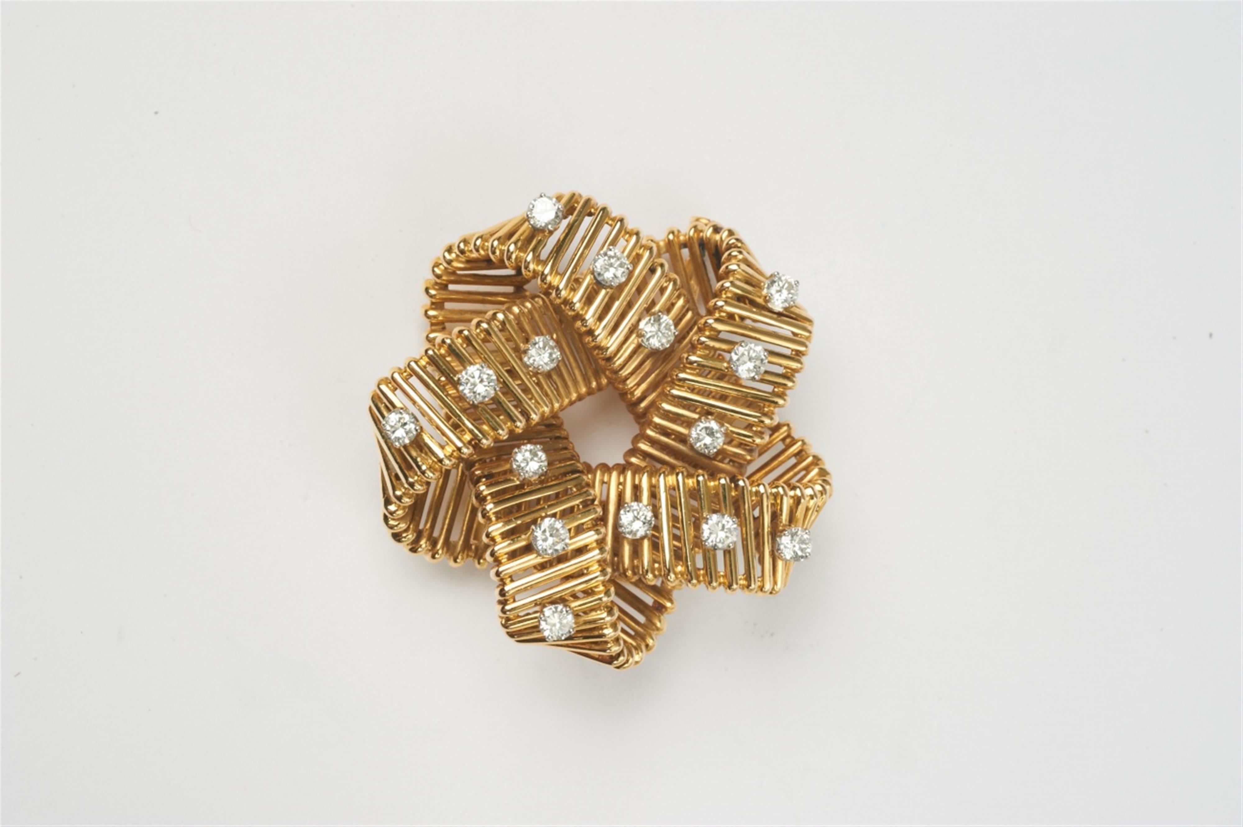 A French 18k gold and diamond clip brooch by Hermés - image-1