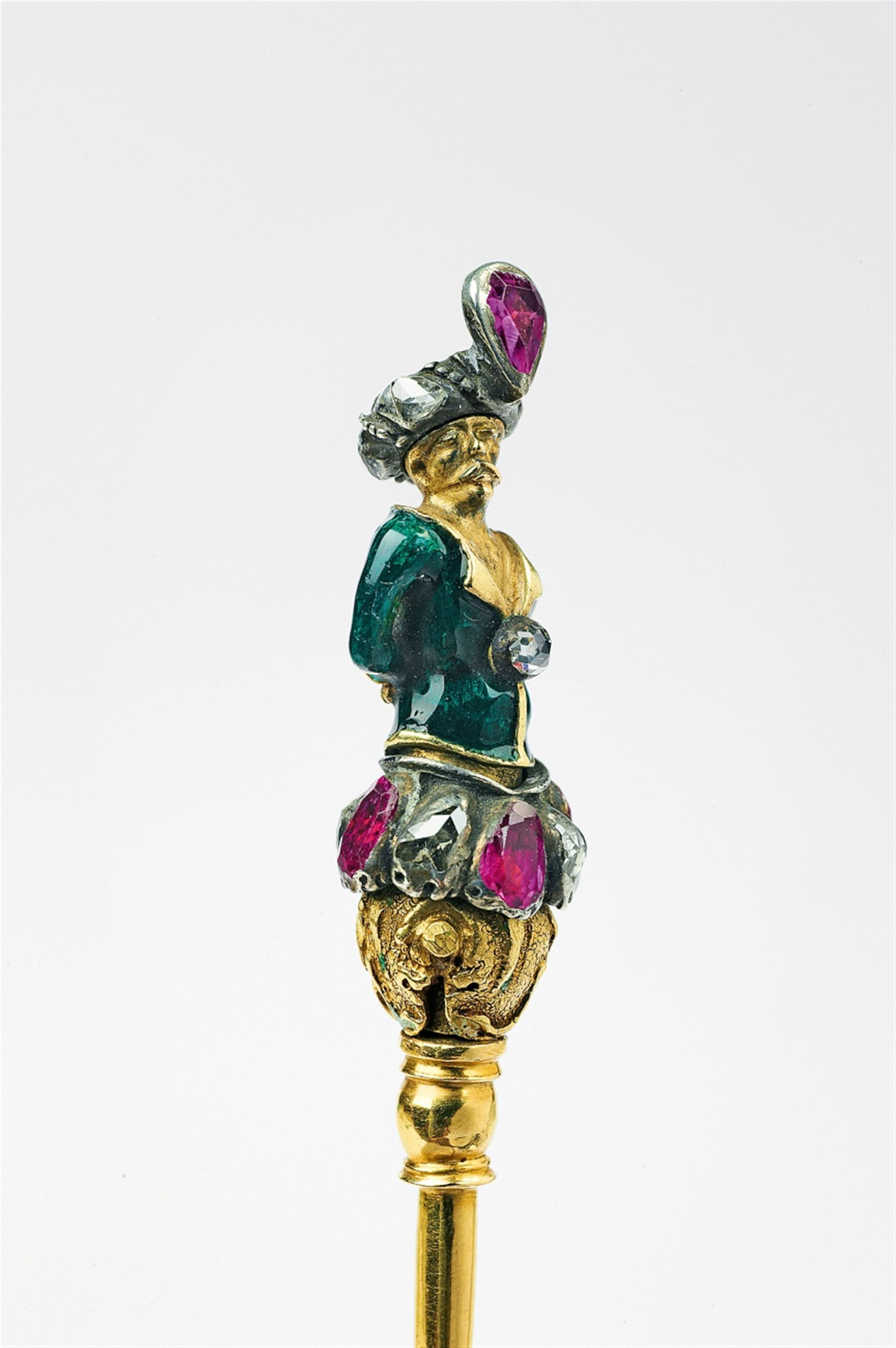 A gold, silver, enamel gem-set hat pin with an Oriental figure - image-1