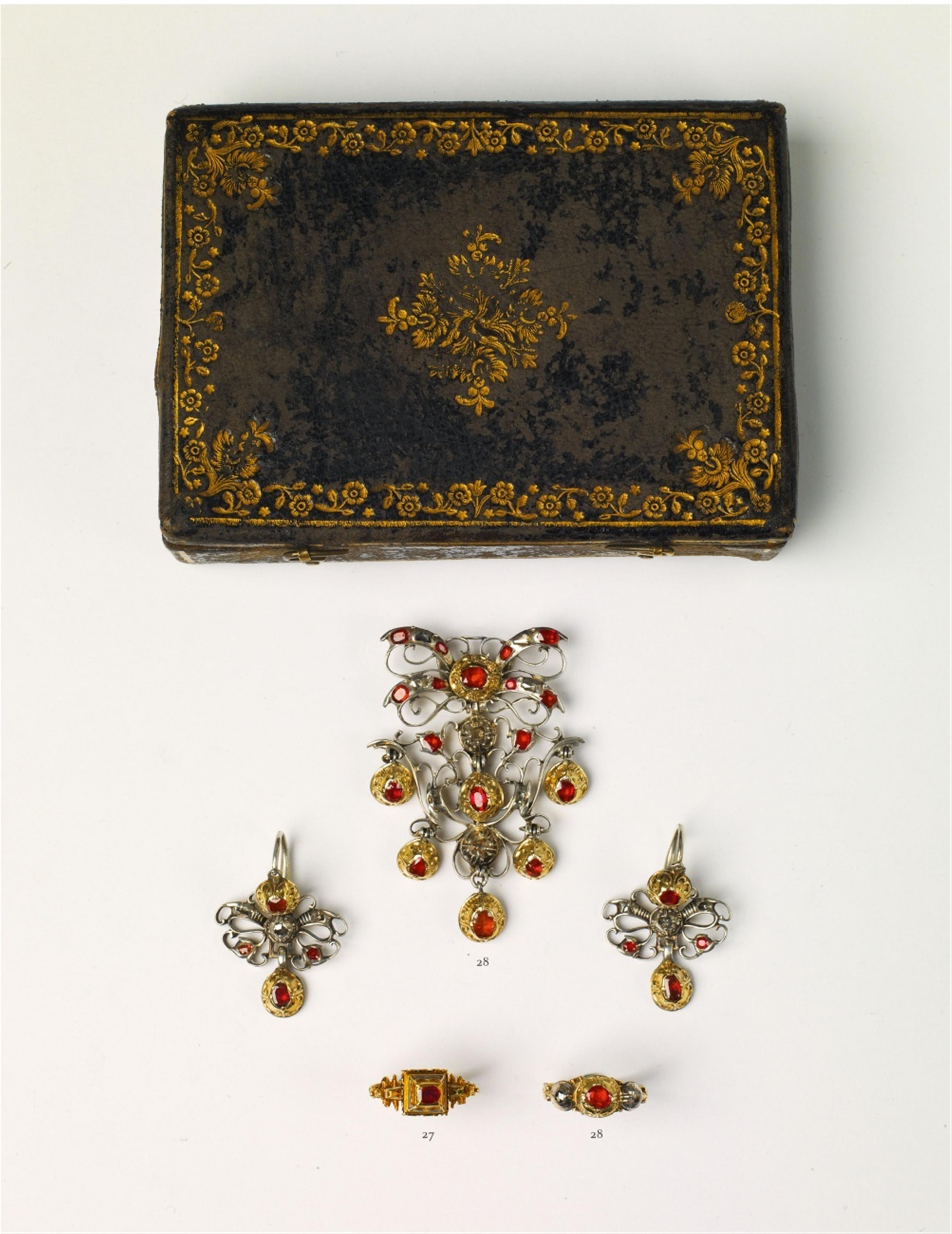 A Baroque silver gilt and ruby demi-parure - image-1