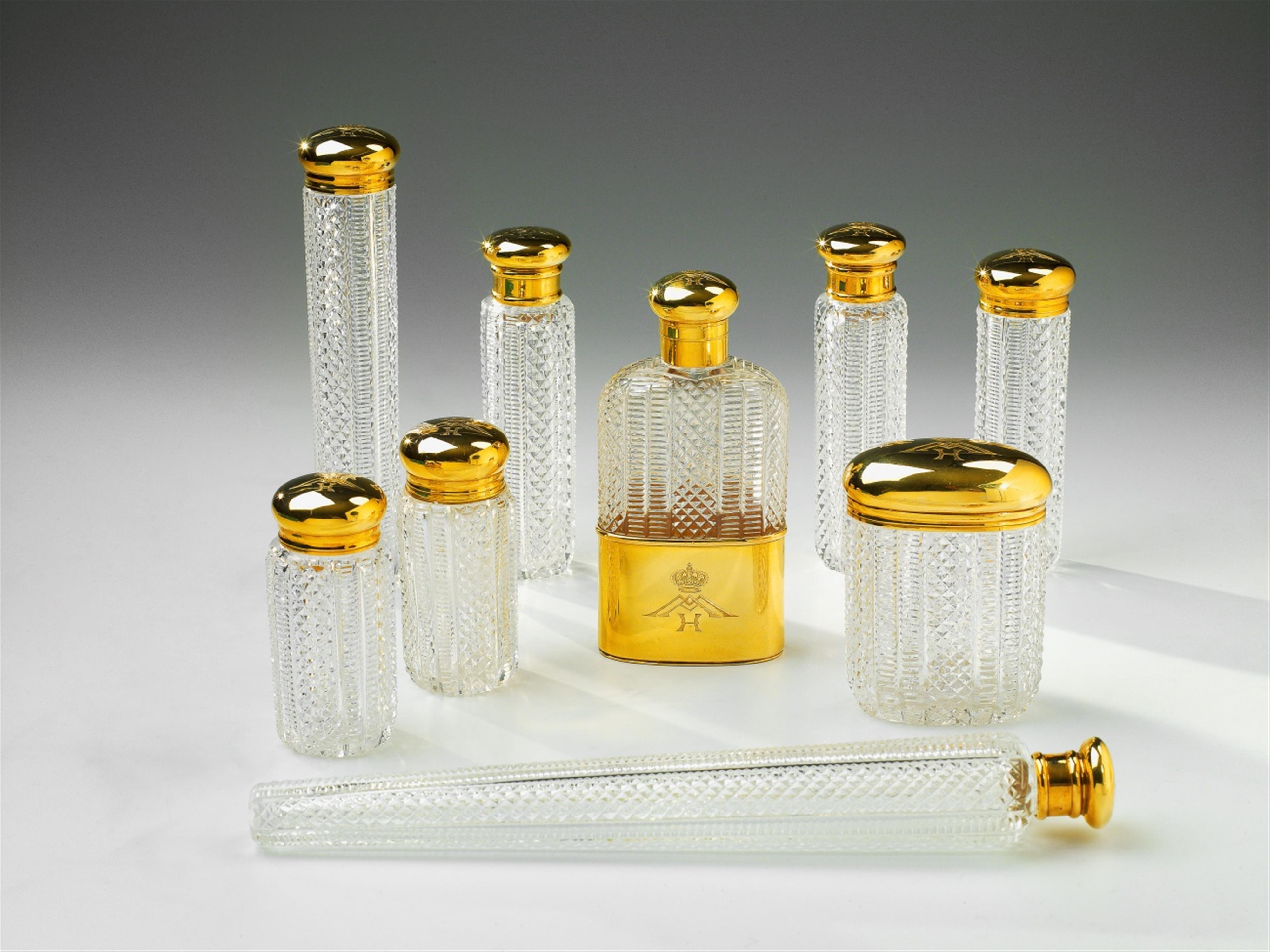 An 18k gold-mounted crystal glass Royal toilette suite - image-1