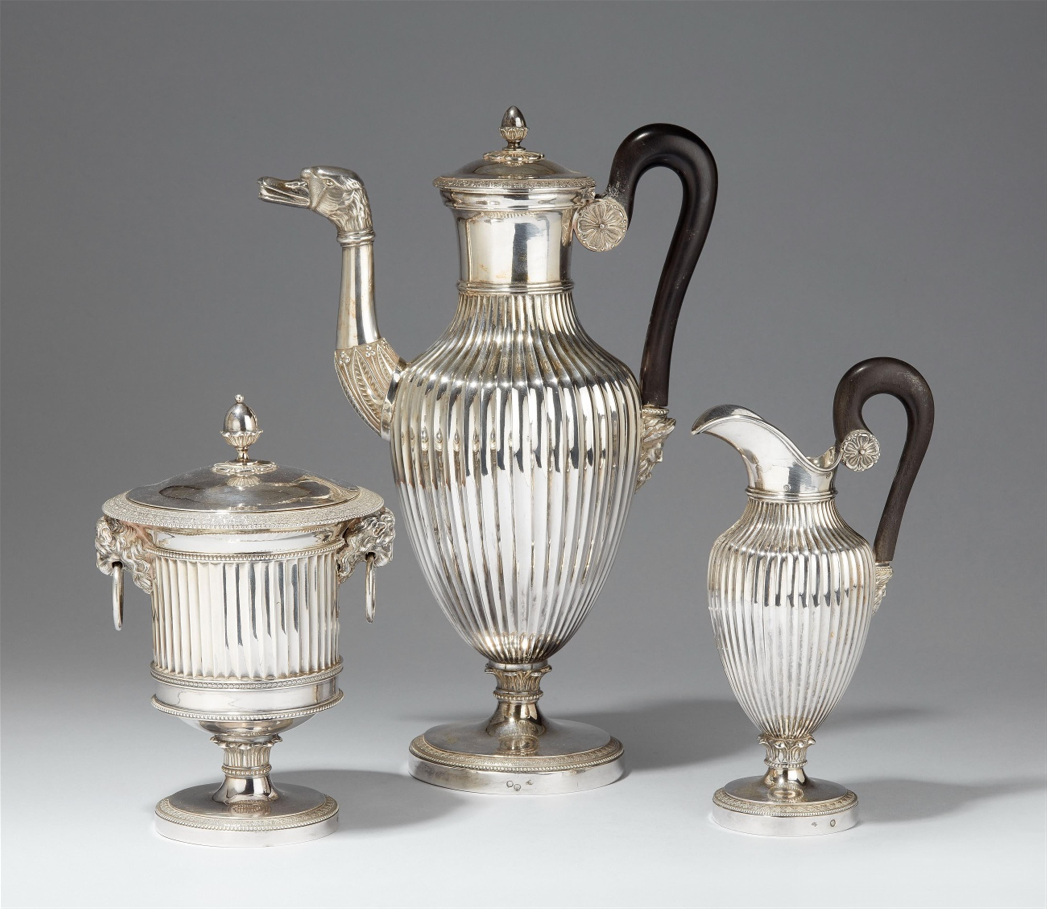 A Brussels silver coffee service. Comprising coffee pot, milk jug and sugar box. Marks of Joseph Germain Dutalis, ca. 1830. - image-1