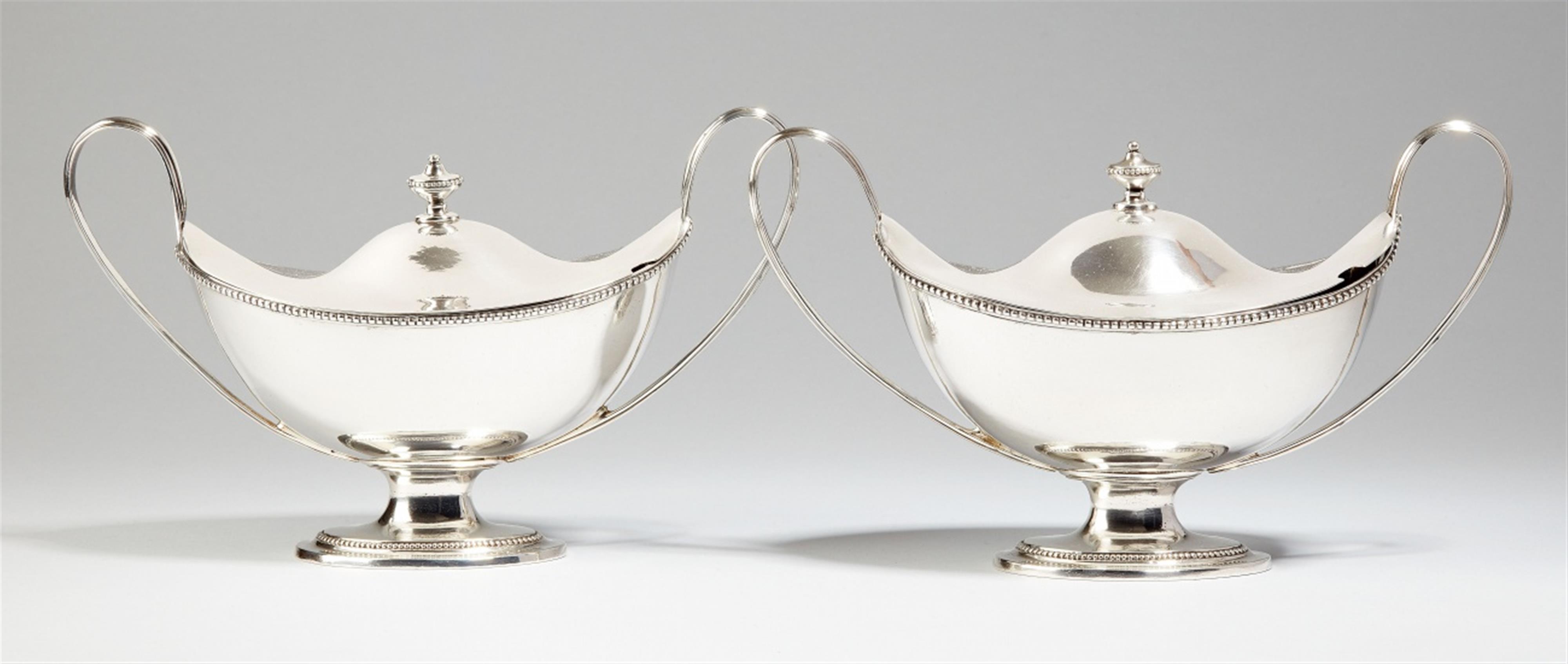 A pair of George III London silver sauce boats and covers. Marks of Edward Fernell, 1784. - image-1