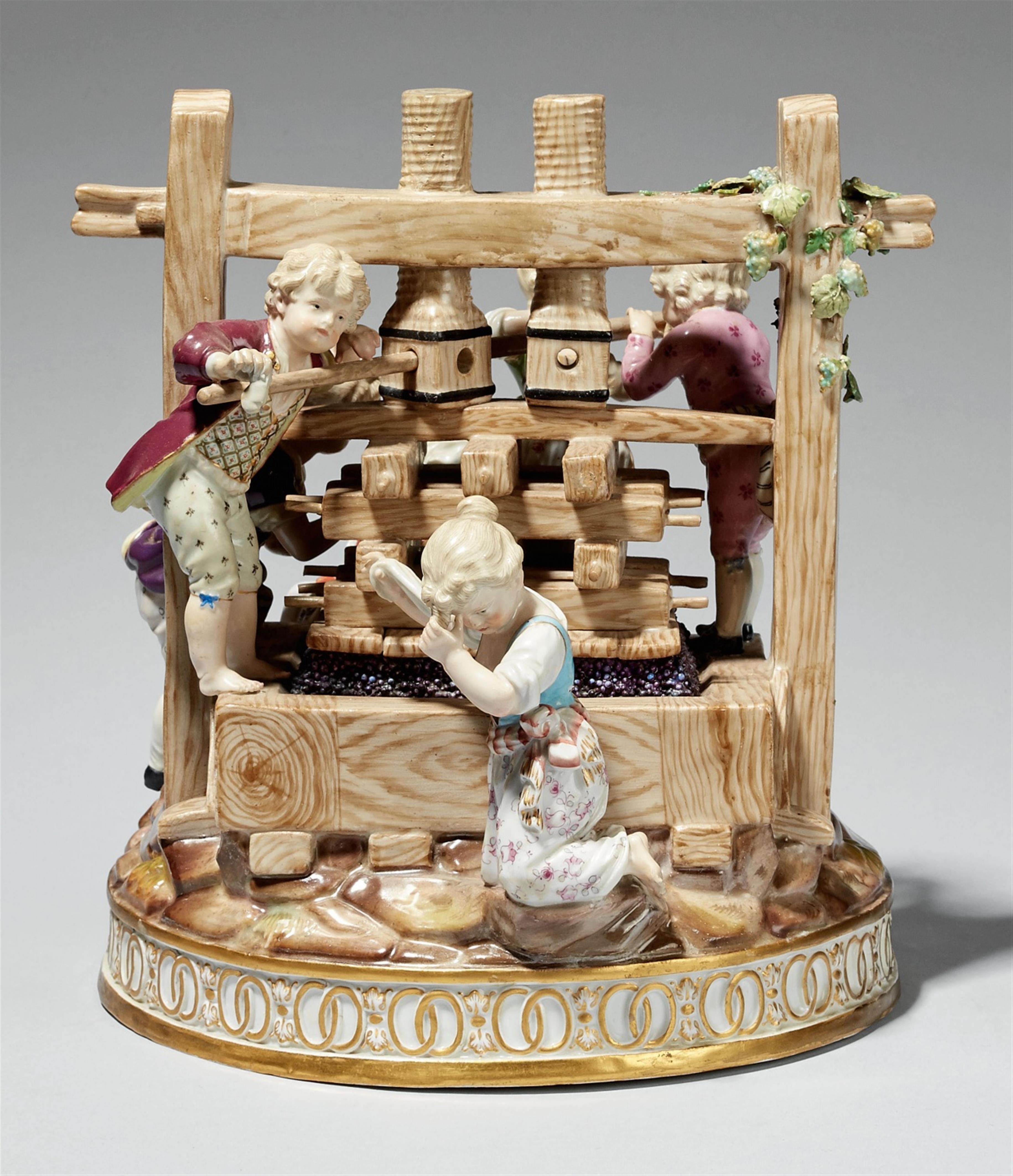 A Meissen porcelain group with children at a wine press - image-2