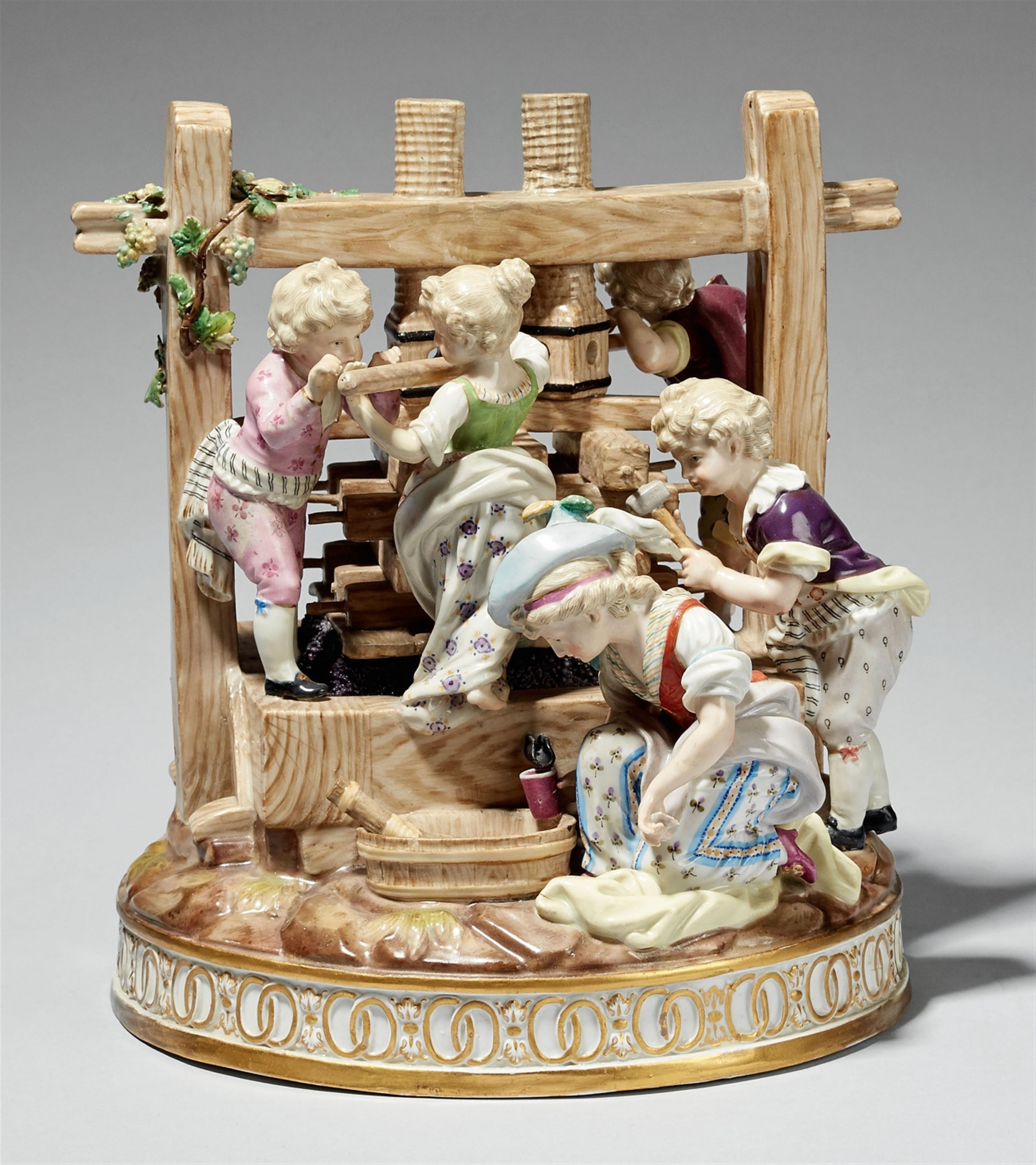 A Meissen porcelain group with children at a wine press - image-1